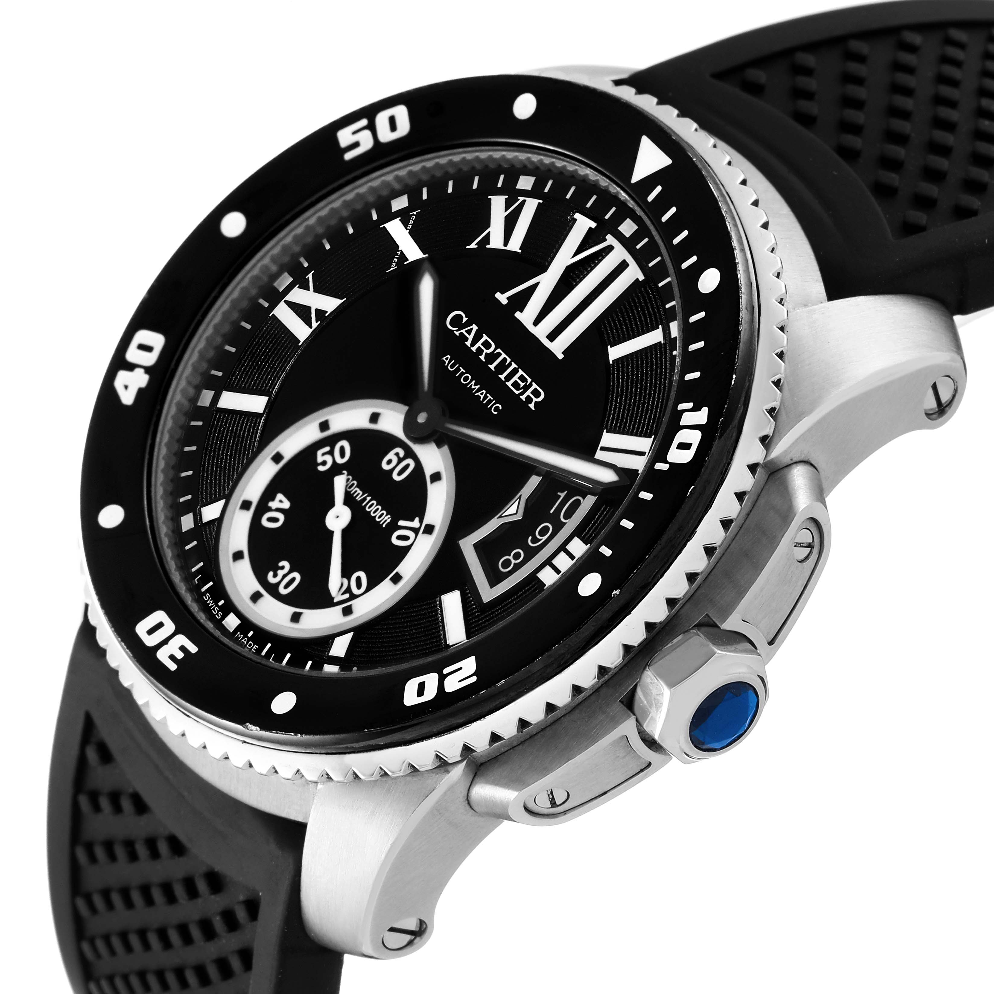 The image shows a Calibre de Cartier watch by Cartier at an angle highlighting the dial, bezel, crown, and part of the strap.