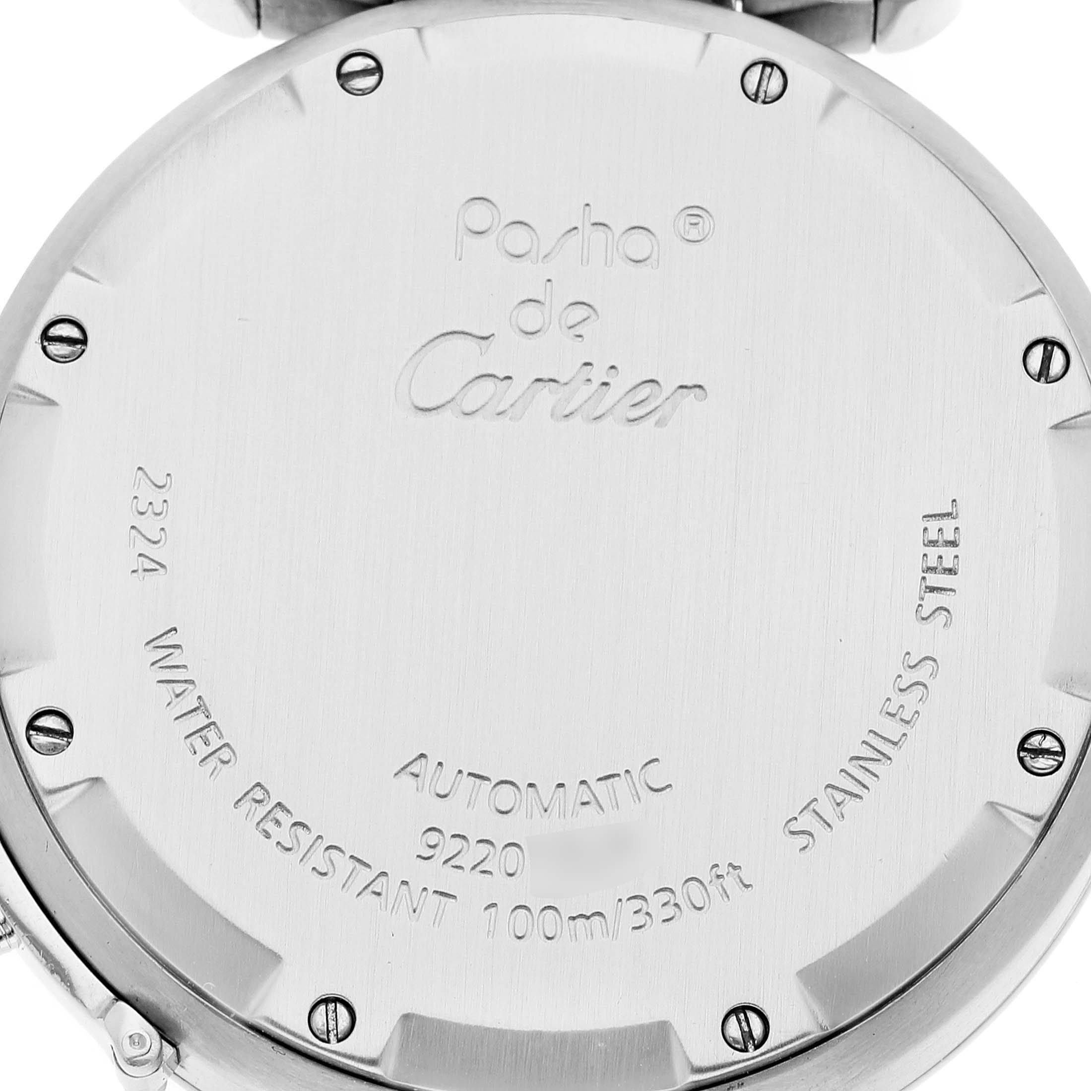 This image shows the back case of the Pasha de Cartier watch, highlighting its engravings and screws.