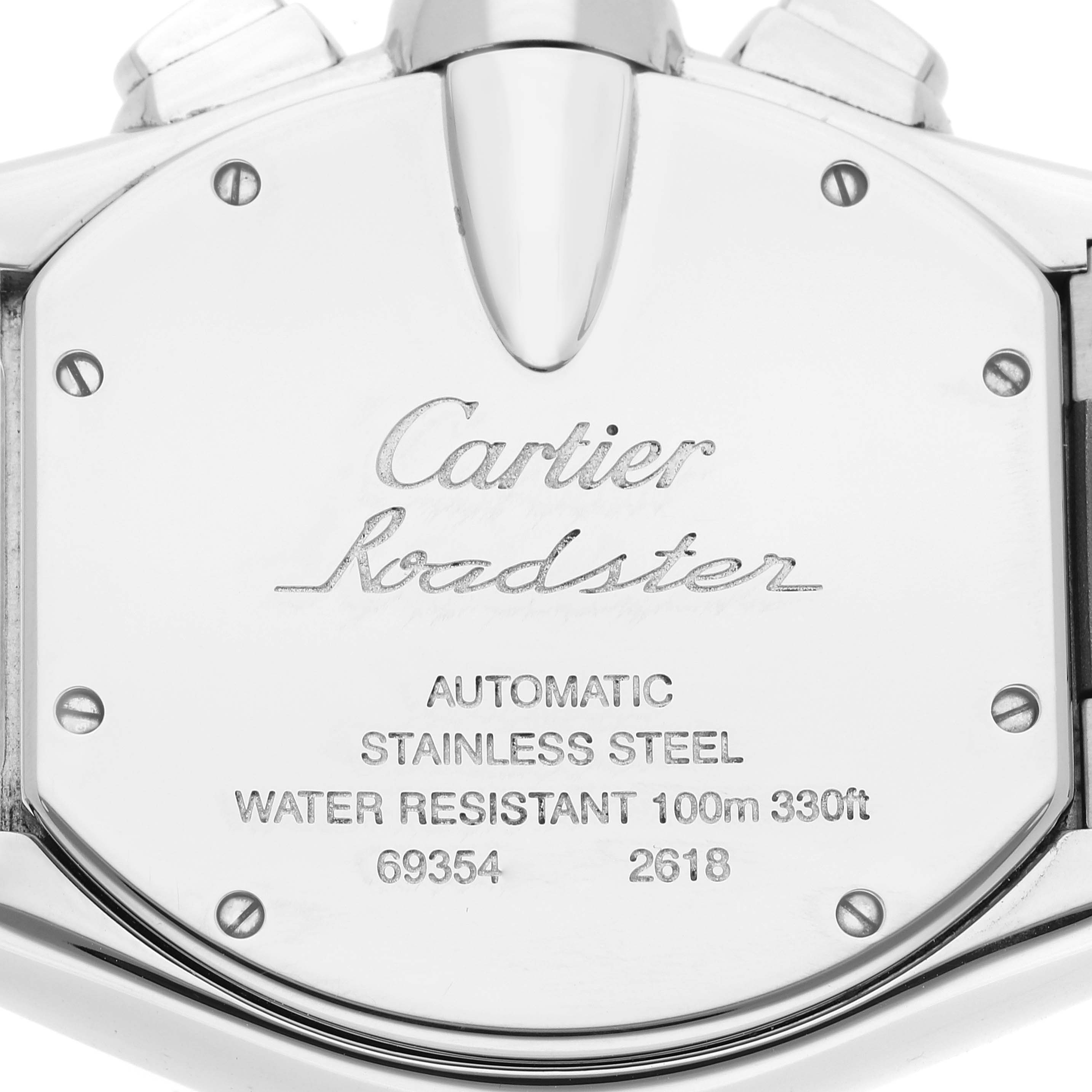 This image shows the stainless steel back case of a Cartier Roadster W62019X6 Men's Stainless Steel Silver Dial W62019X6 Men's Stainless Steel Silver Dial watch, displaying engravings of model information and water resistance.