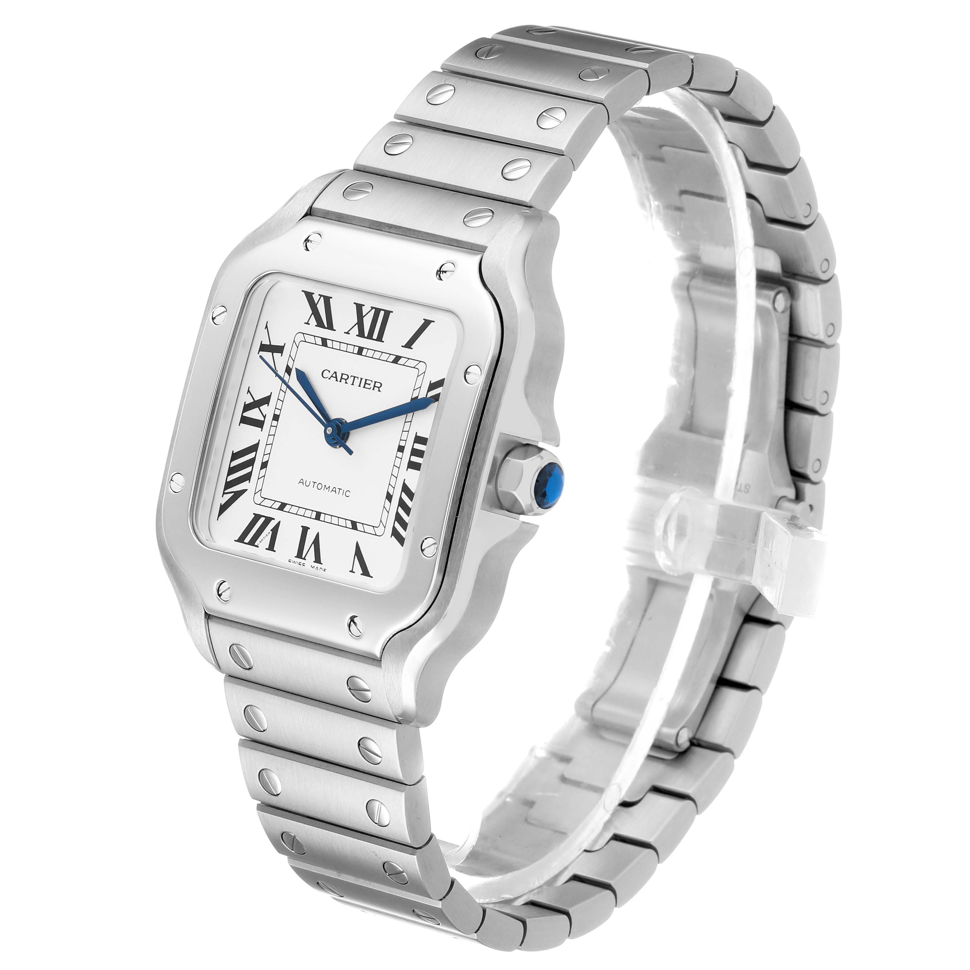 The Cartier Santos WSSA0029 Men's Stainless Steel Silver Dial watch is shown at a three-quarter angle, displaying its face, bezel, and bracelet.
