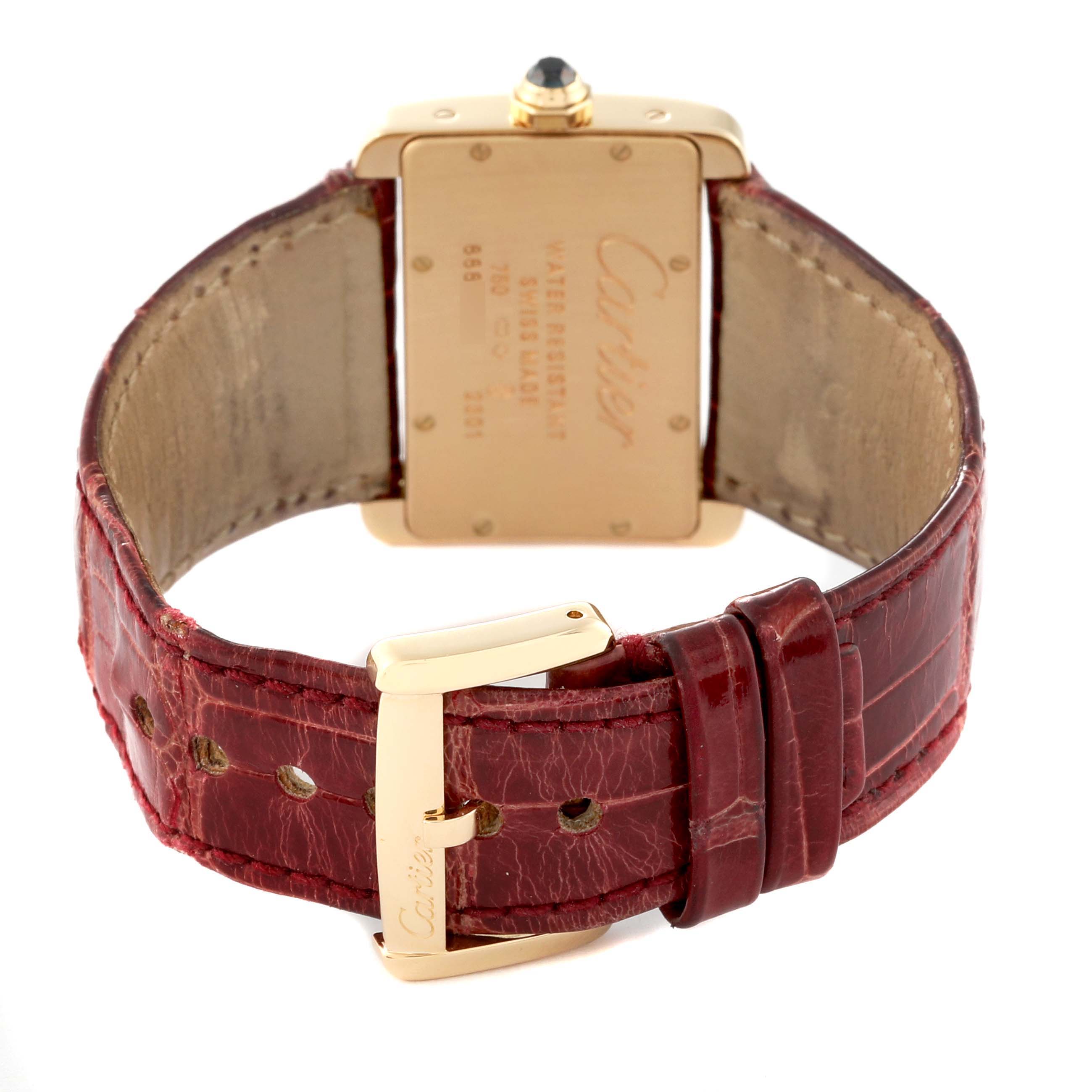 The image shows the back of the Cartier Tank Divan W6300356 Women's Yellow Gold Silver Dial W6300356 Women's Yellow Gold Silver Dial watch, focusing on the rear case and leather strap buckle.