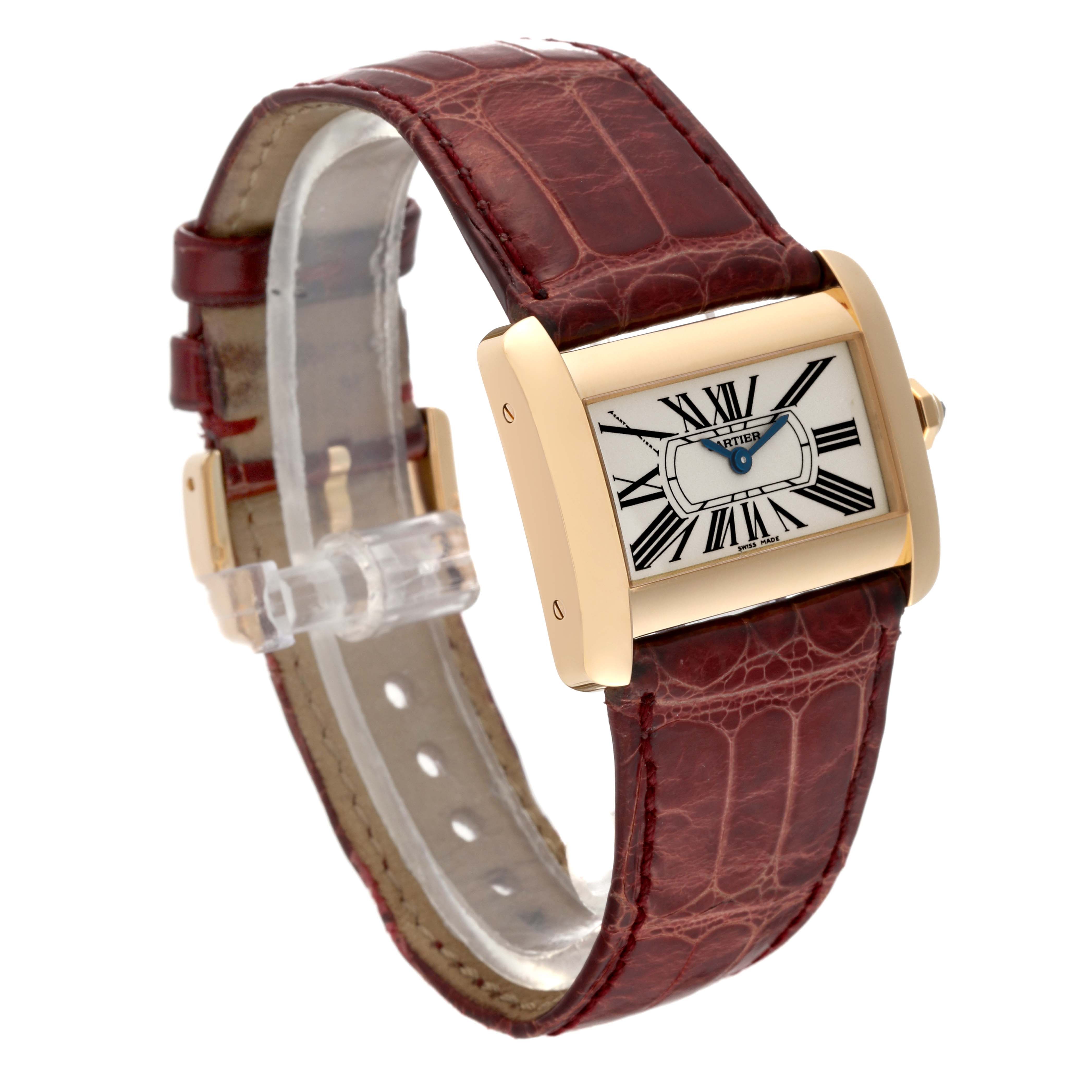 The Cartier Tank Divan W6300356 Women's Yellow Gold Silver Dial W6300356 Women's Yellow Gold Silver Dial watch is shown at a three-quarter angle, highlighting its rectangular gold case, Roman numeral dial, and brown leather strap.