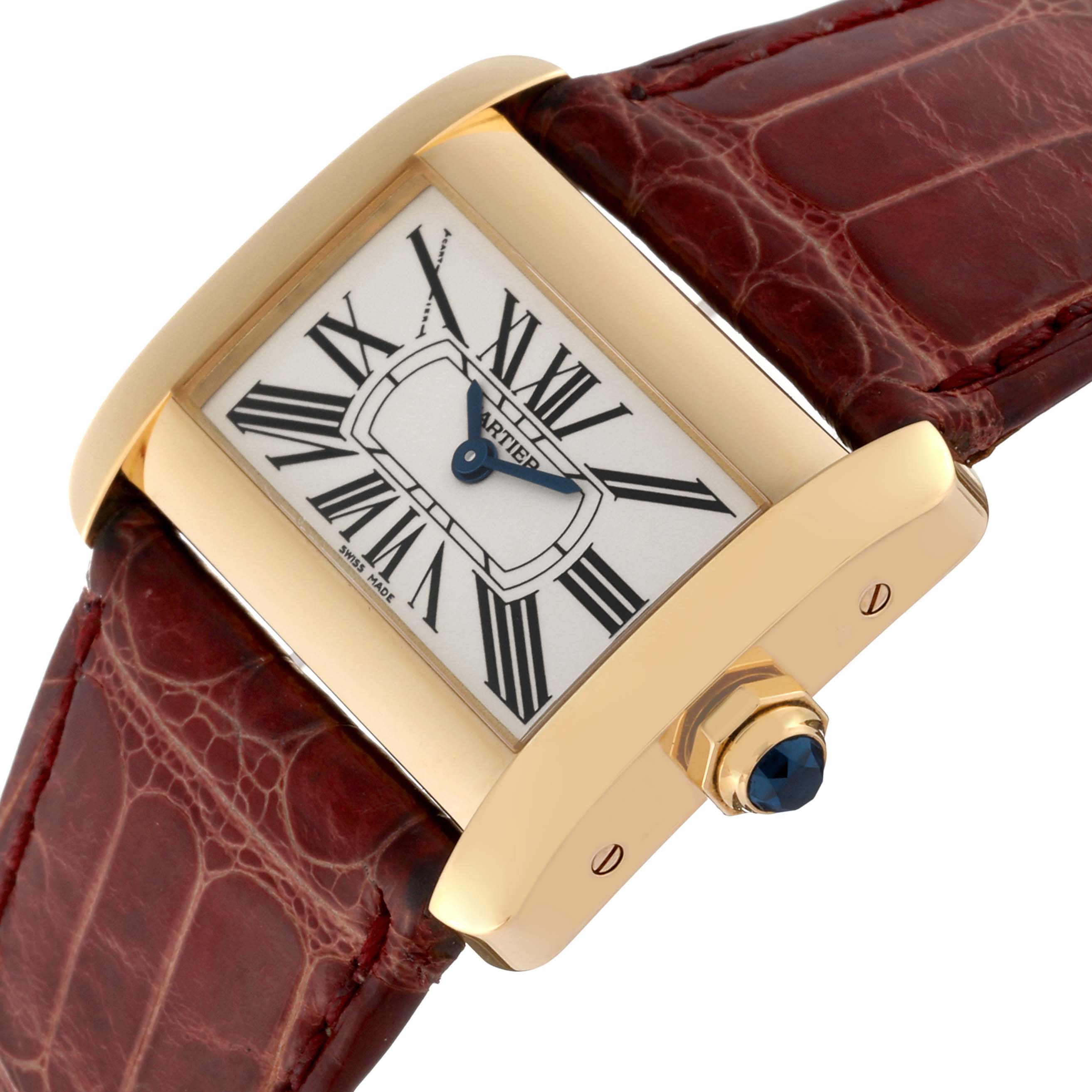 The image shows a Cartier Tank Divan W6300356 Women's Yellow Gold Silver Dial W6300356 Women's Yellow Gold Silver Dial watch at an angle, highlighting its dial, gold case, winder, and leather strap.