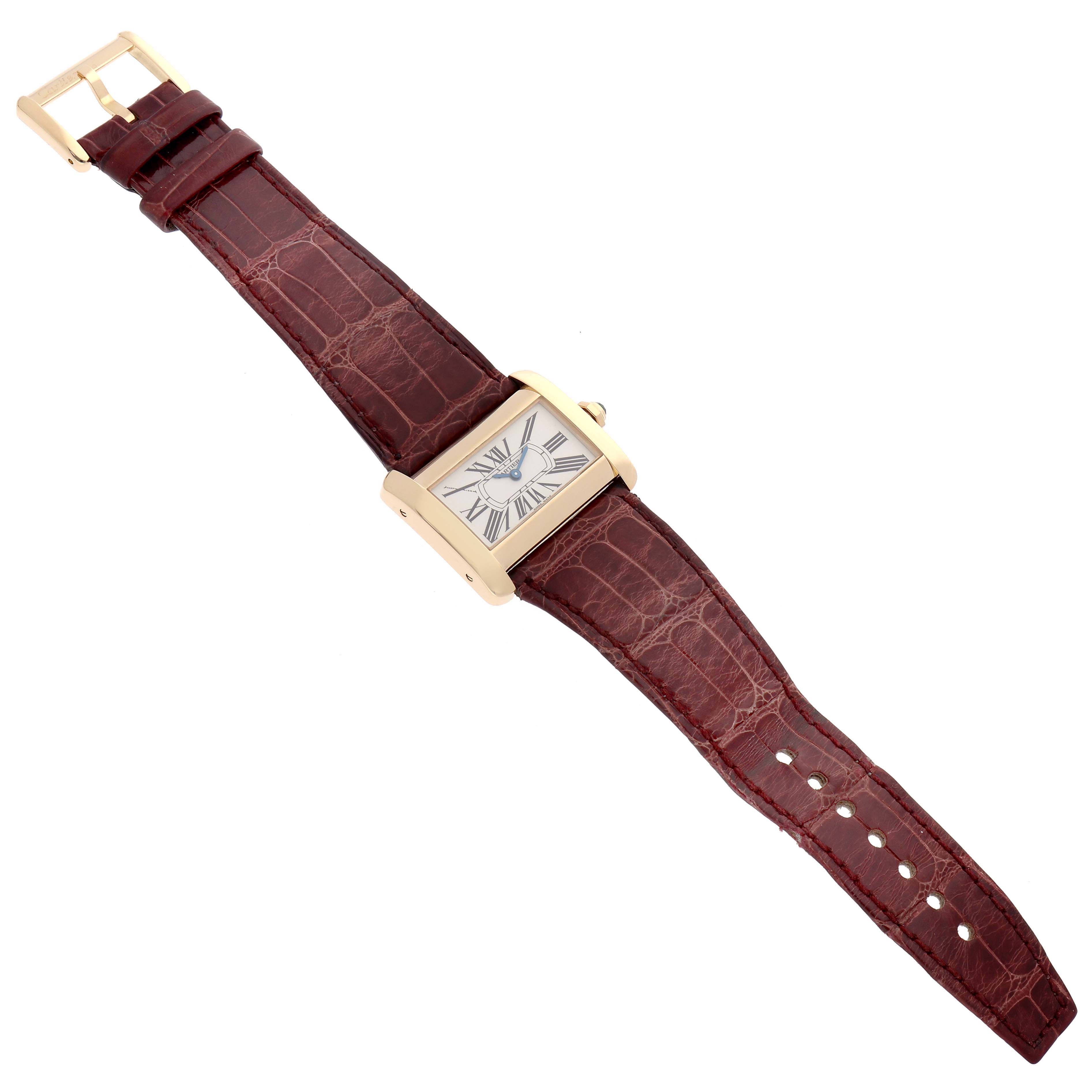 The image shows a Cartier Tank Divan W6300356 Women's Yellow Gold Silver Dial W6300356 Women's Yellow Gold Silver Dial watch in a top-down view with its strap fully extended.