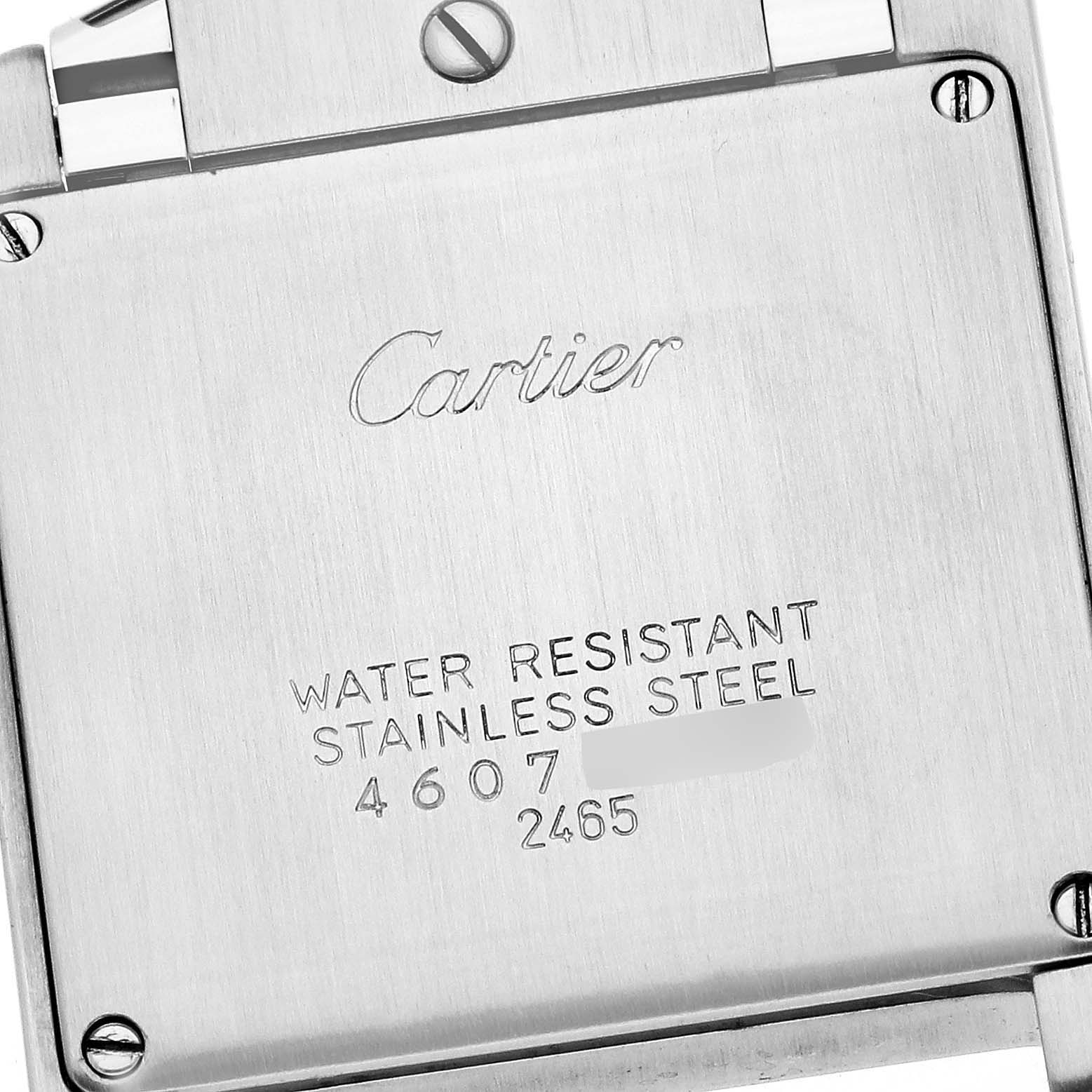 This image shows the back case of a Cartier Tank Francaise W51011Q3 Women
s Stainless Steel Silver Dial W51011Q3 Women
s Stainless Steel Silver Dial watch, featuring water resistance and stainless steel engravings.