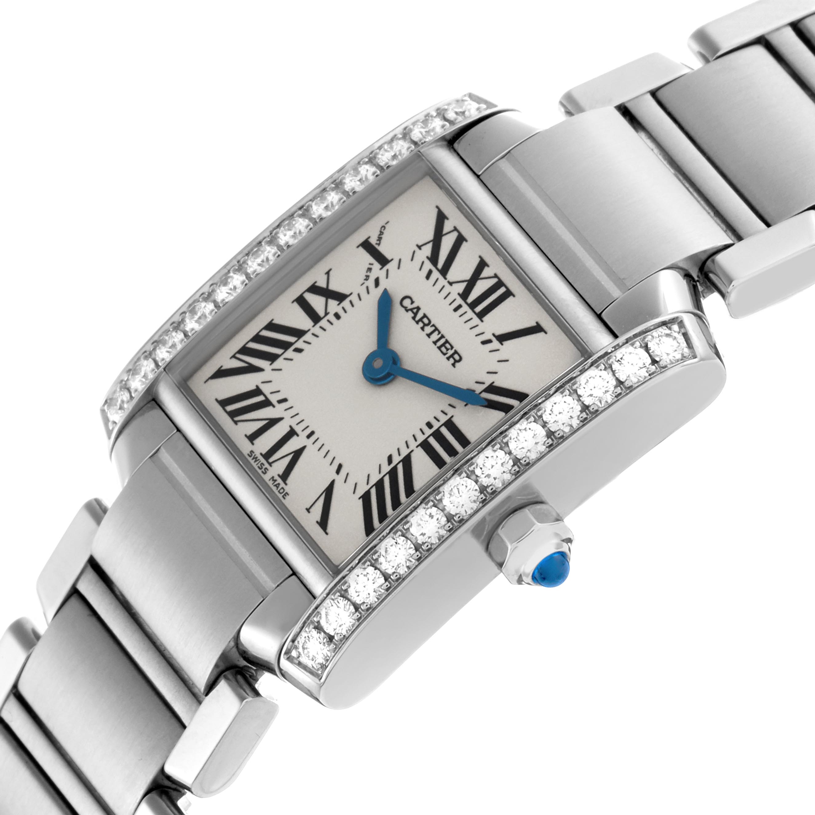 The Cartier Tank Française is shown at an angle highlighting its diamond-set bezel, silver dial, and blue cabochon crown.