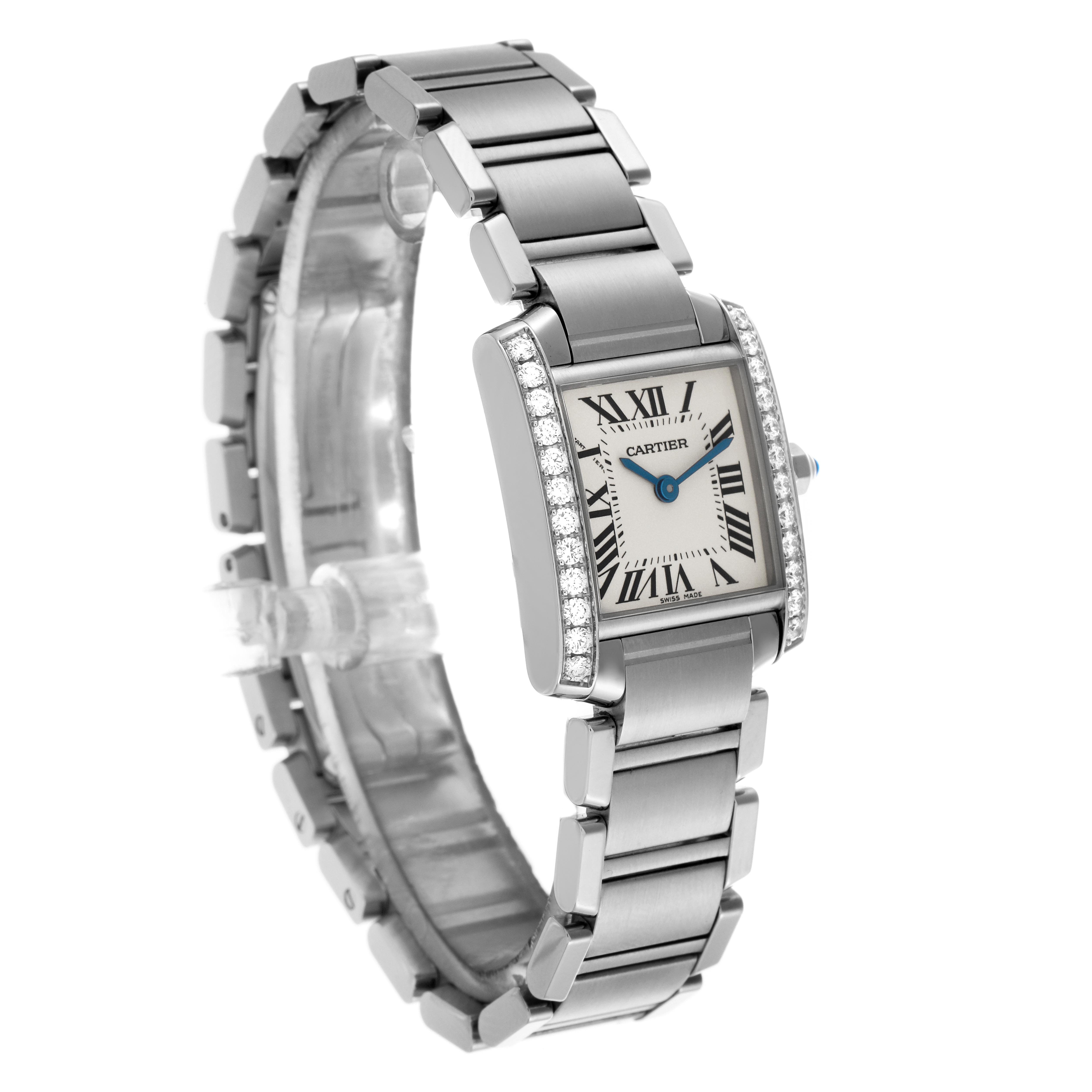 The Cartier Tank Française watch is shown at a three-quarter angle, highlighting its silver bracelet, diamond-set bezel, and rectangular face.