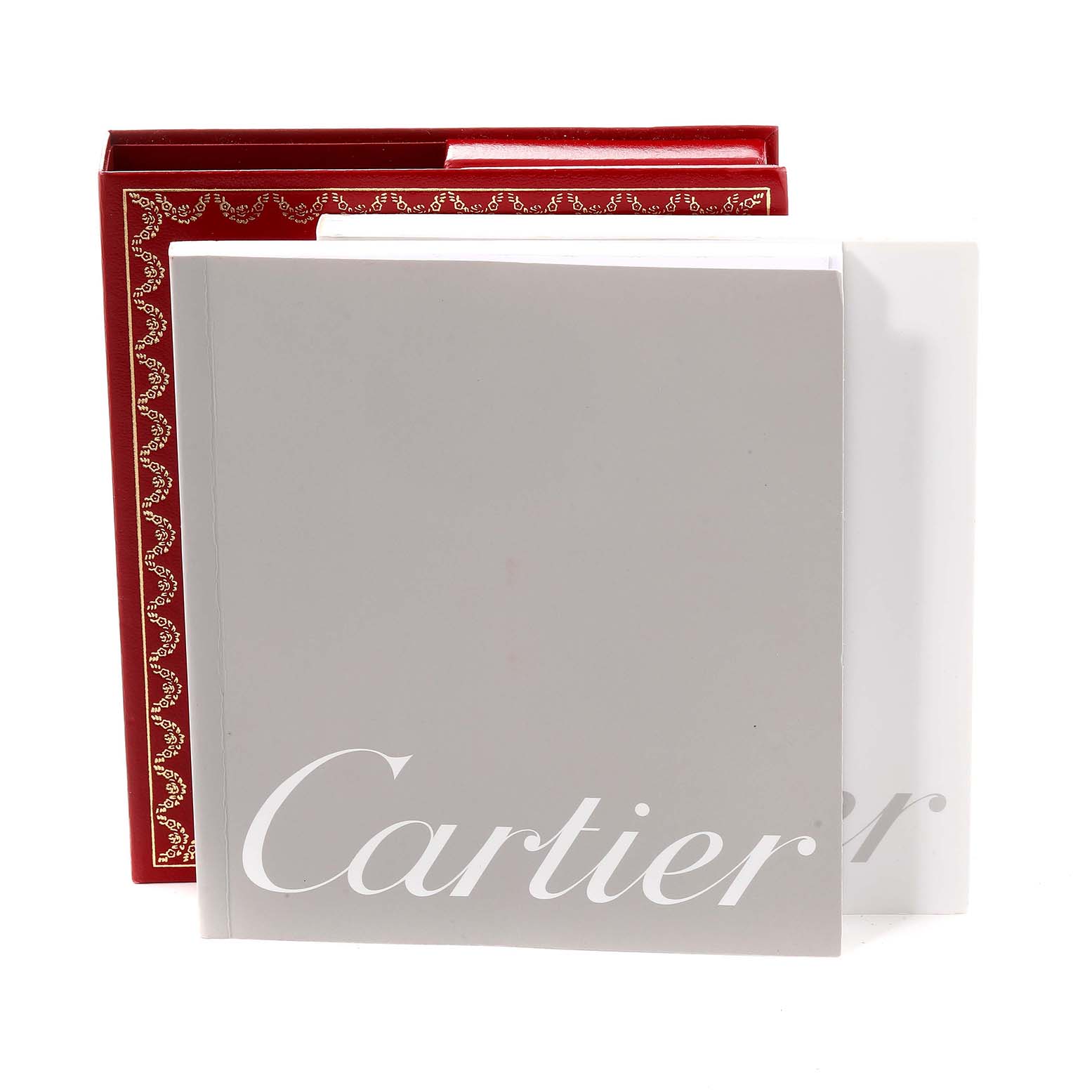 The image shows the packaging and documentation for the Cartier Tank Française model, featuring a red box and branded booklet.