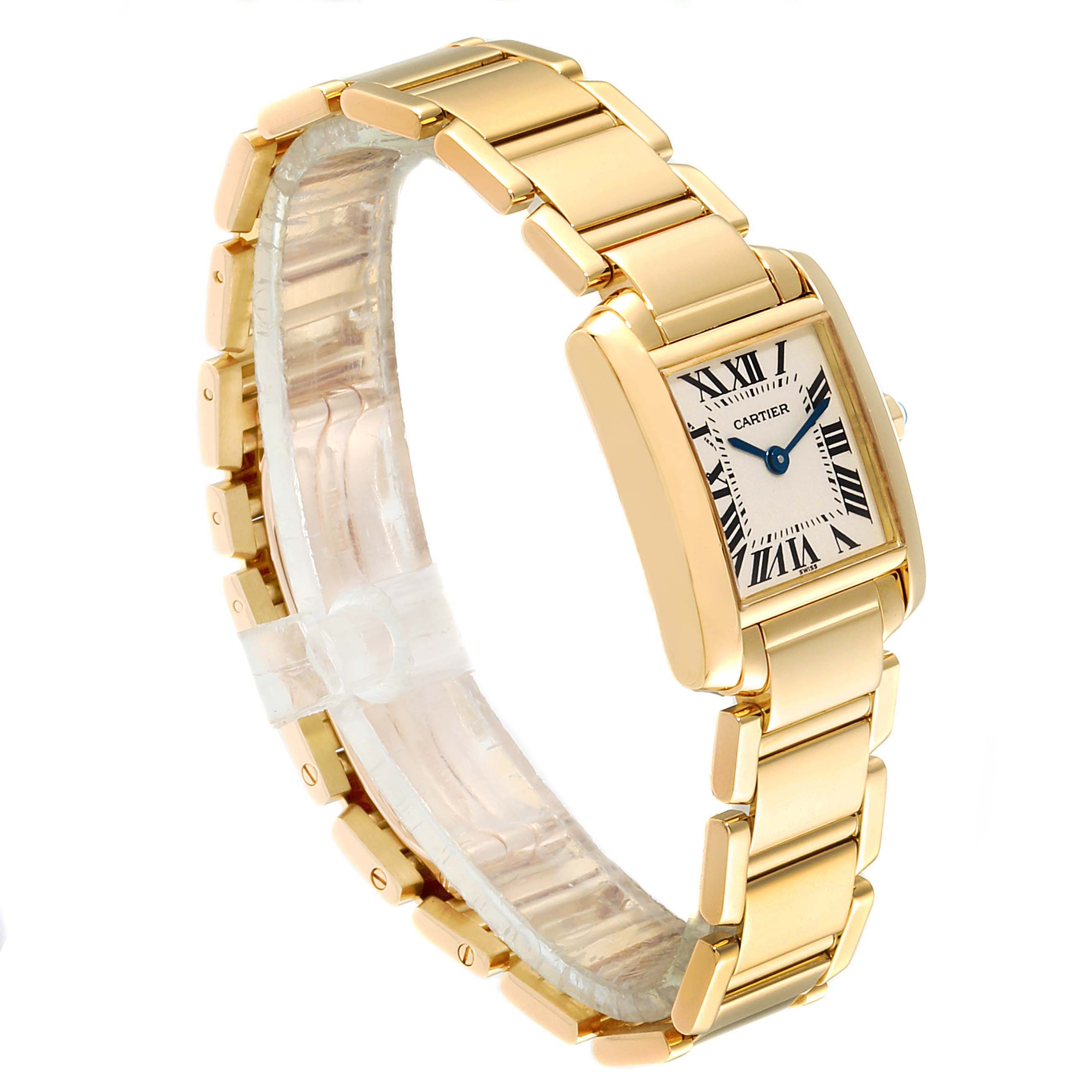 The image shows a side angle view of a Cartier Tank Francaise W50002N2 Women's Yellow Gold Silver Dial W50002N2 Women's Yellow Gold Silver Dial watch, highlighting its gold bracelet and rectangular face.