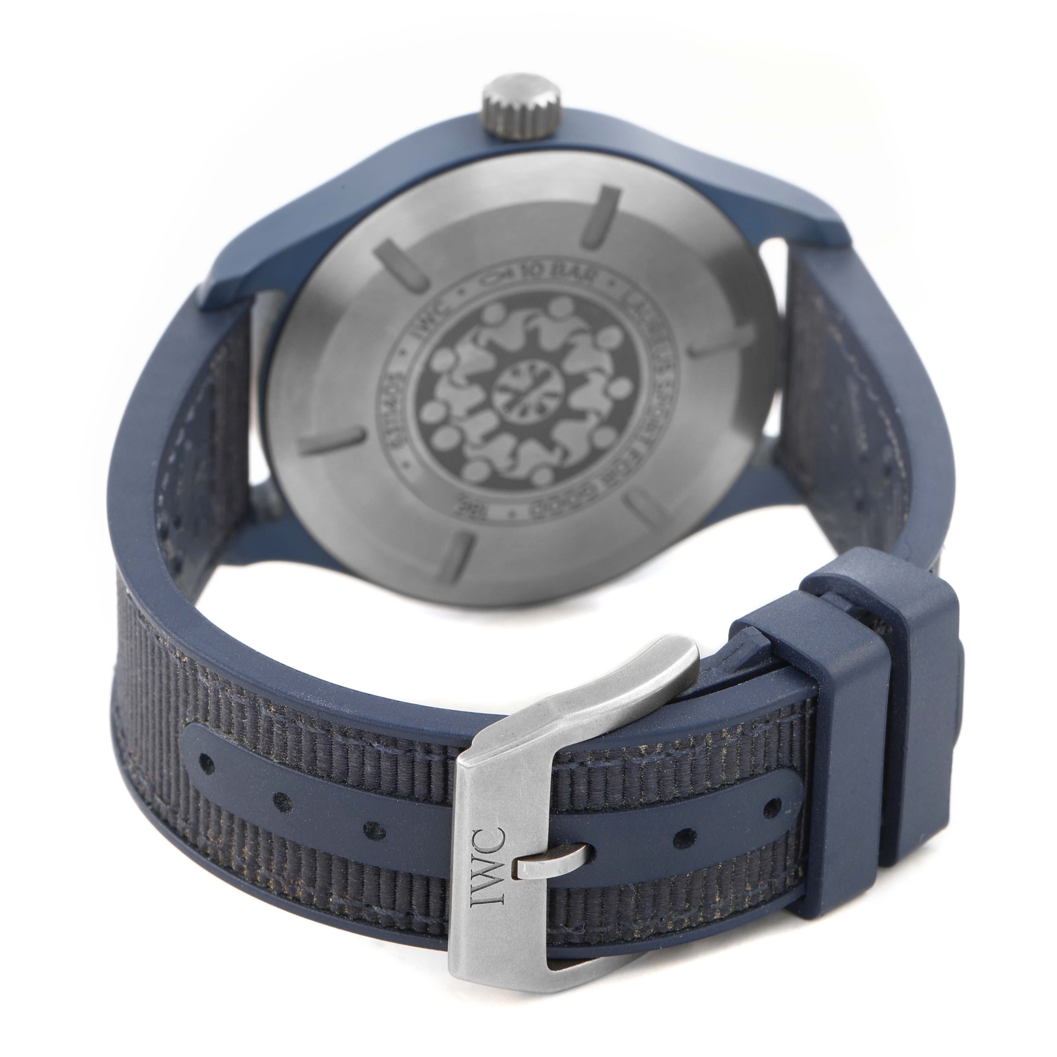 The IWC Pilot IW328101 Men's Ceramic Blue Dial watch is shown from the back angle, highlighting the case back, strap, and buckle.