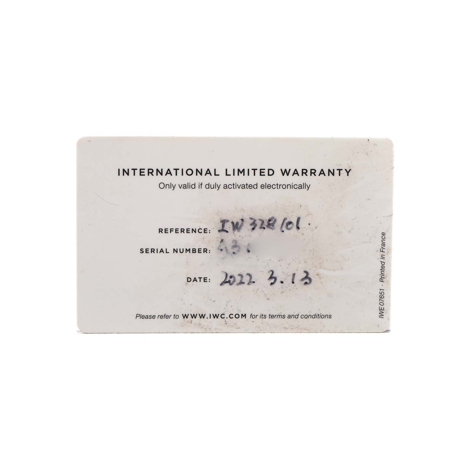 The image shows an IWC Pilot IW328101 Men's Ceramic Blue Dial model watch's international limited warranty card.