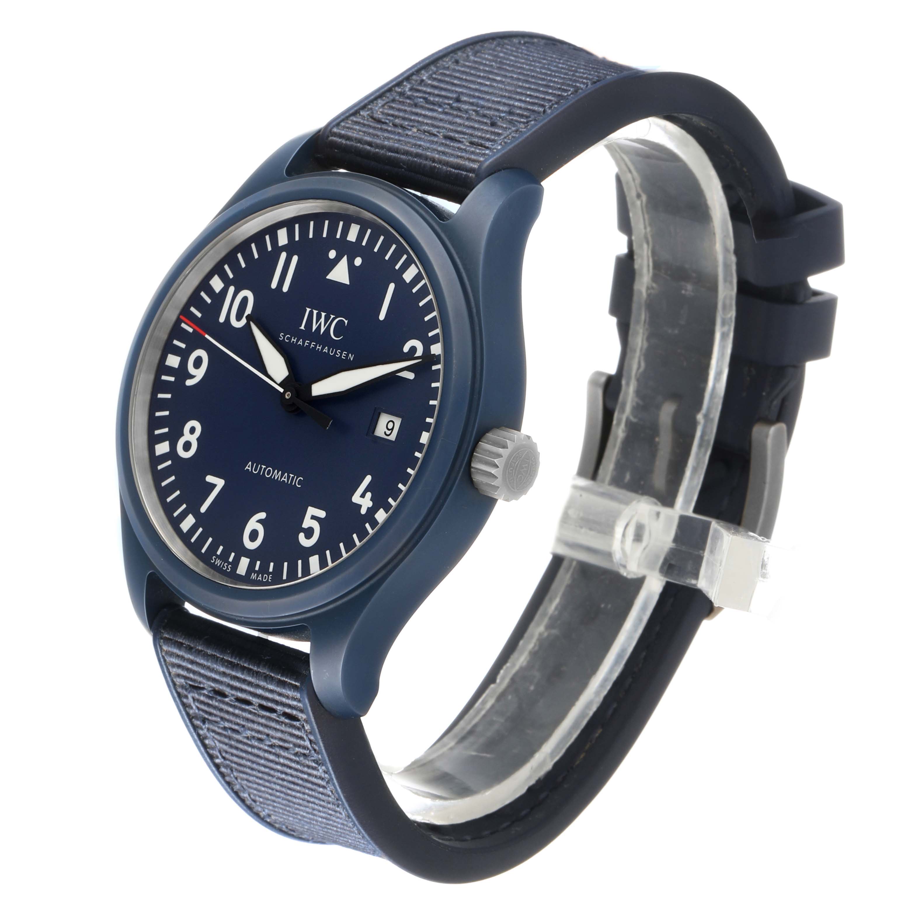 The IWC Pilot IW328101 Men's Ceramic Blue Dial model watch is shown at a slight angle, highlighting the dial, crown, and strap.