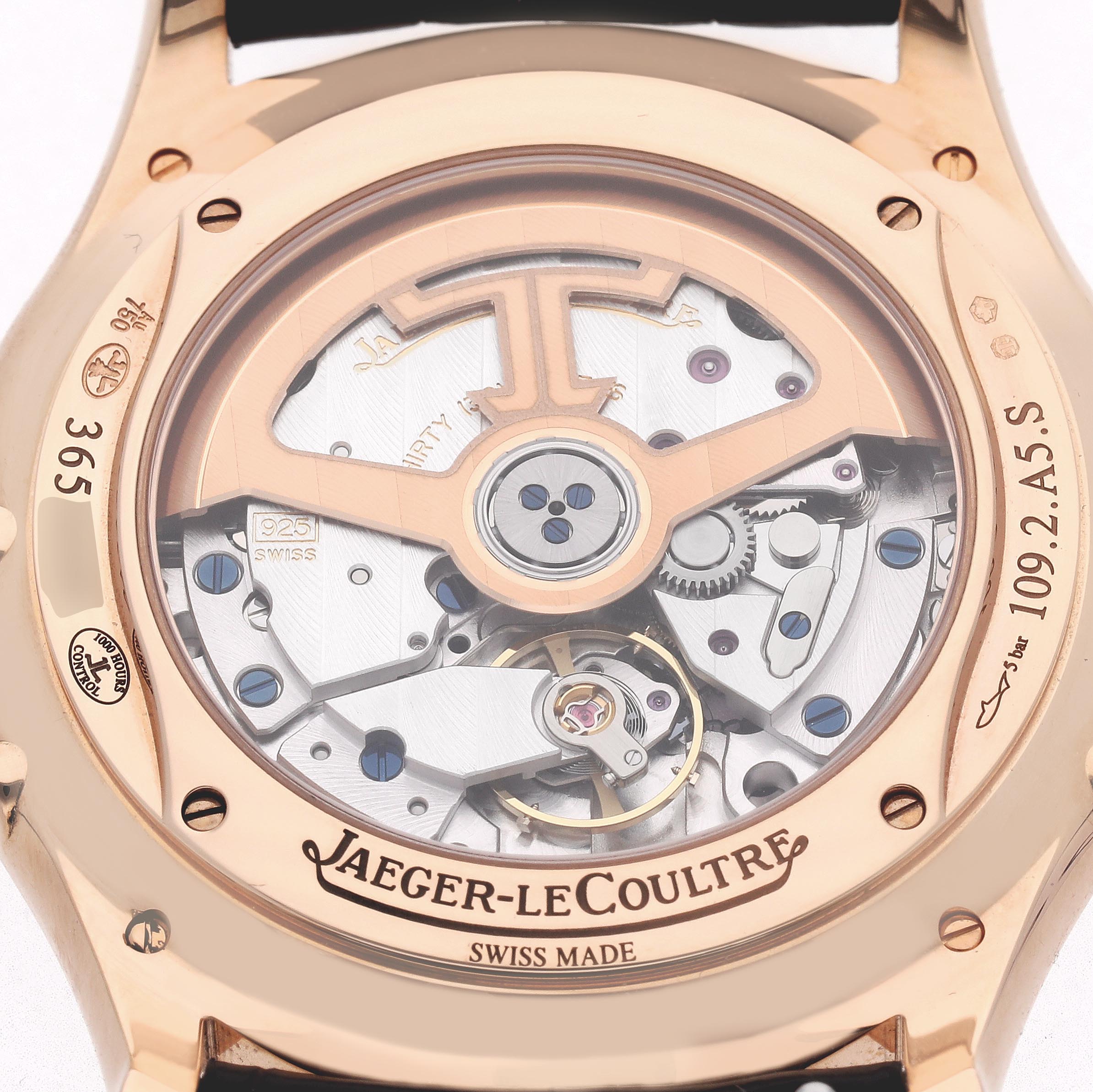 The image shows the back of a Jaeger LeCoultre Master Q1362510 Men
s Rose Gold Beige Dial Q1362510 Men
s Rose Gold Beige Dial model, highlighting the intricate movement and rotor.