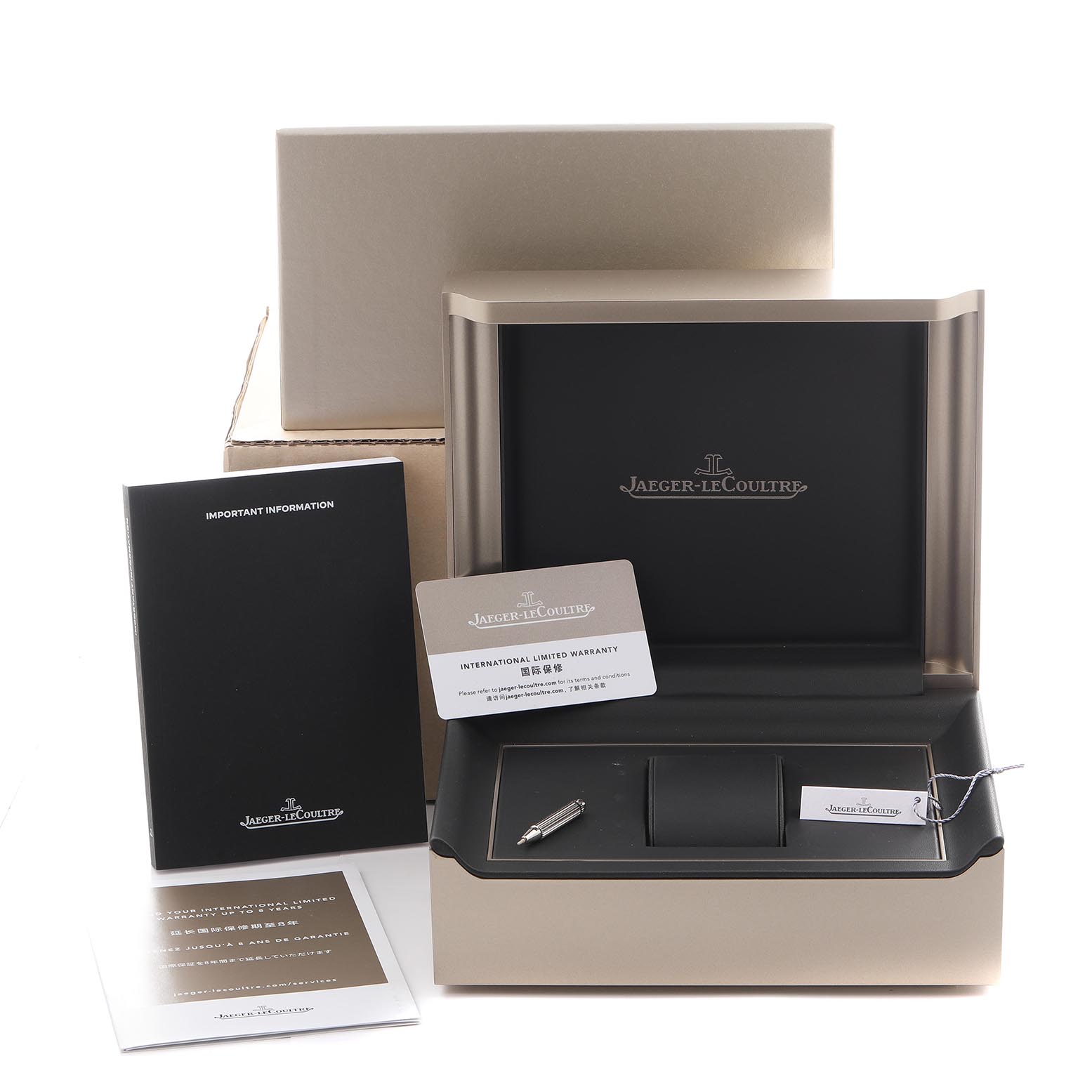 The image shows the Jaeger-LeCoultre Master model packaging, including the box, warranty card, manual, and accessories.