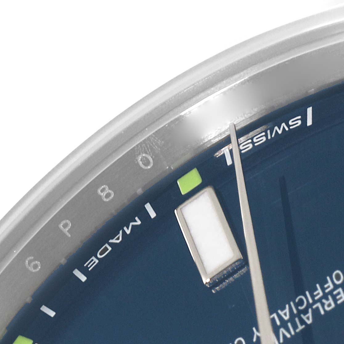 The image shows a close-up of the face, hour markers, and the second hand of a Rolex Oyster Perpetual 114300 Men
s Stainless Steel Blue Dial 114300 Men
s Stainless Steel Blue Dial watch.