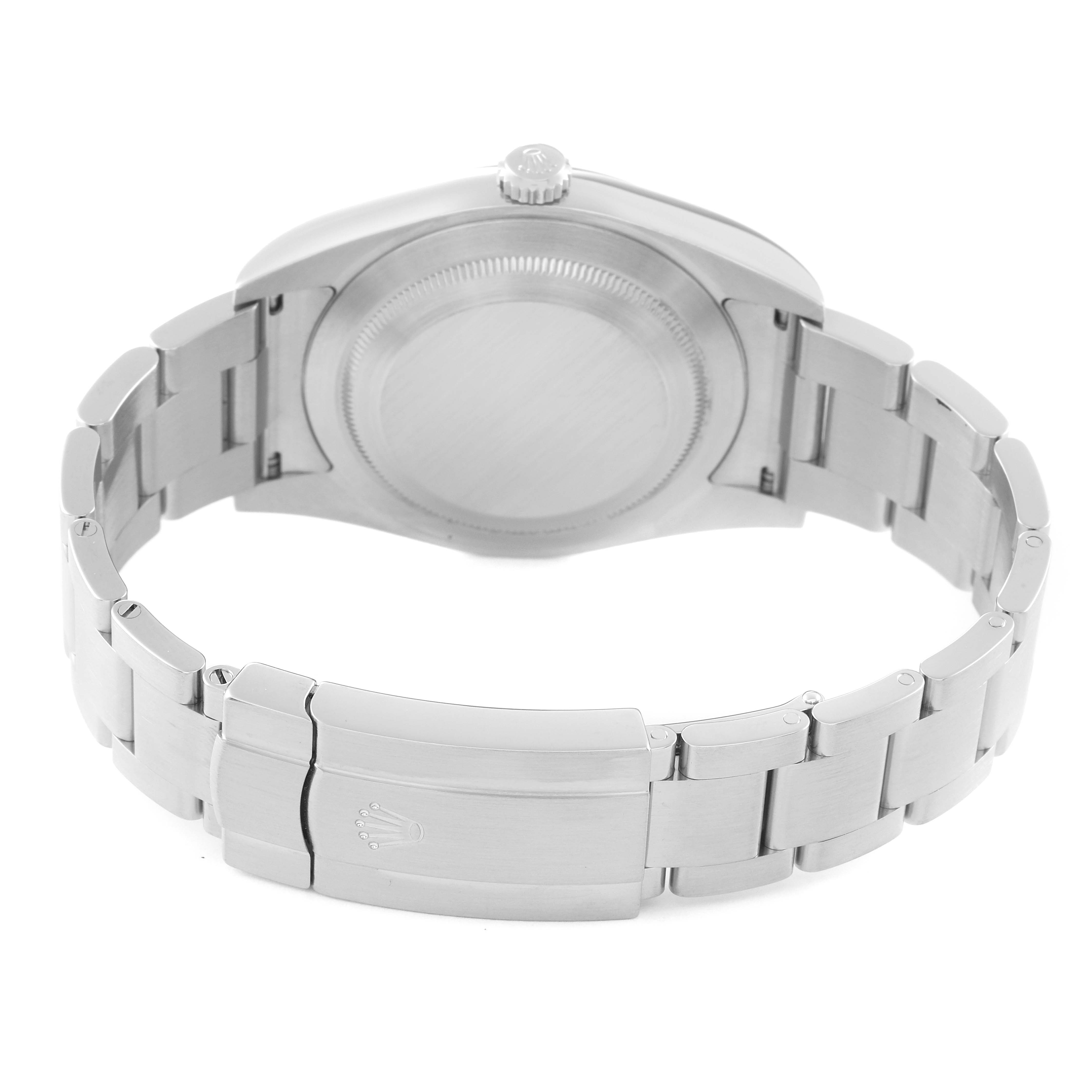 The image shows the back and bracelet clasp of a Rolex Oyster Perpetual 114300 Men
s Stainless Steel Blue Dial 114300 Men
s Stainless Steel Blue Dial watch from a rear angle.