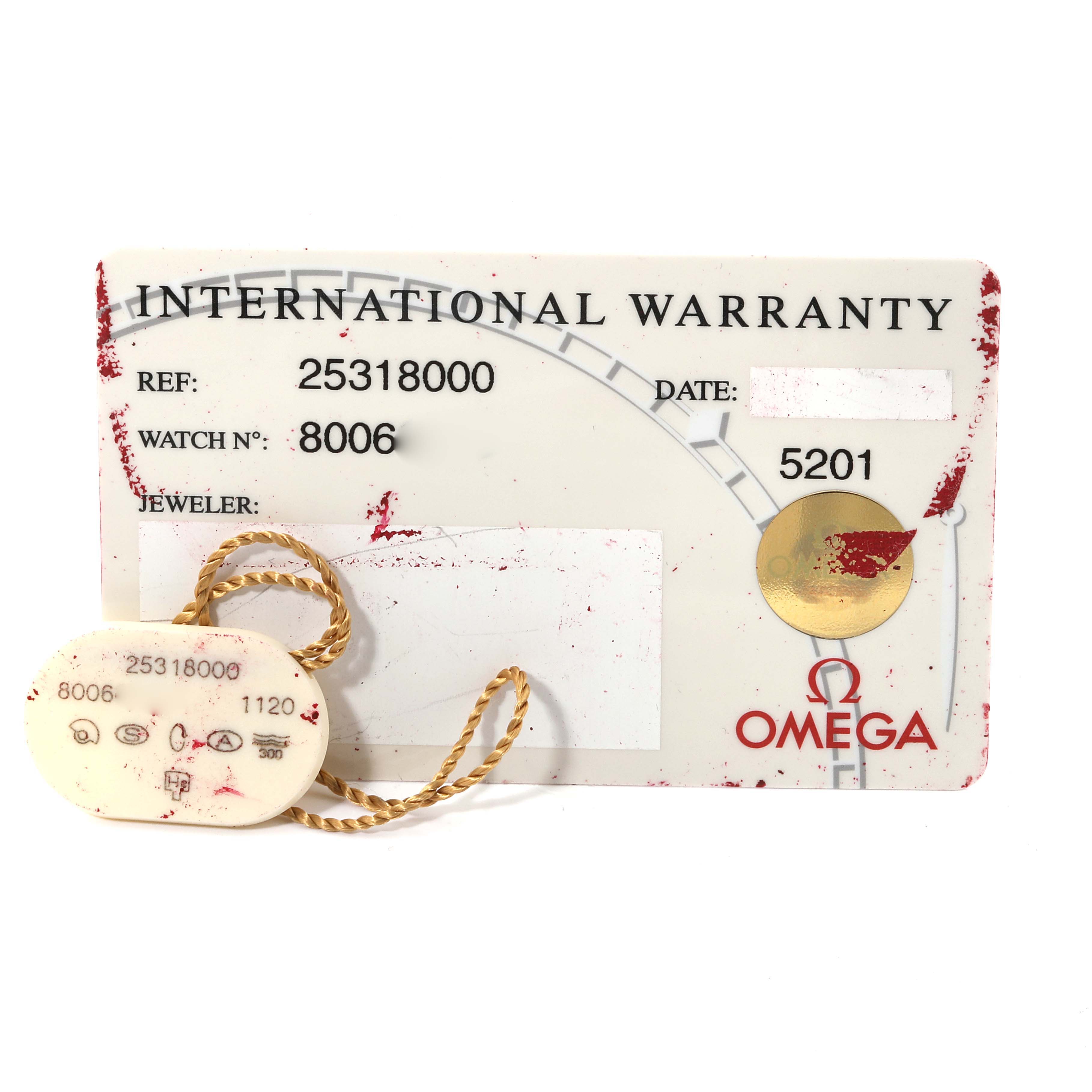 This image shows the international warranty card for an Omega Seamaster 2531.80.00 Men
s Stainless Steel Blue Dial 2531.80.00 Men
s Stainless Steel Blue Dial watch, along with its attached tag.