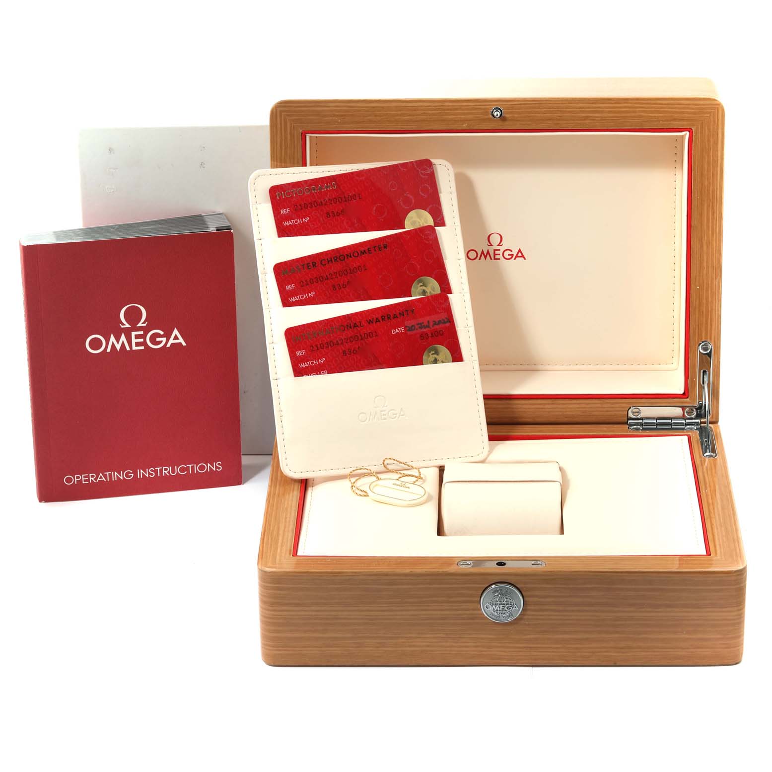 The image shows the accessories of an Omega Seamaster 210.30.42.20.01.001 Men
s Stainless Steel Black Dial 210.30.42.20.01.001 Men
s Stainless Steel Black Dial watch, including the box, operating instructions, and warranty cards.