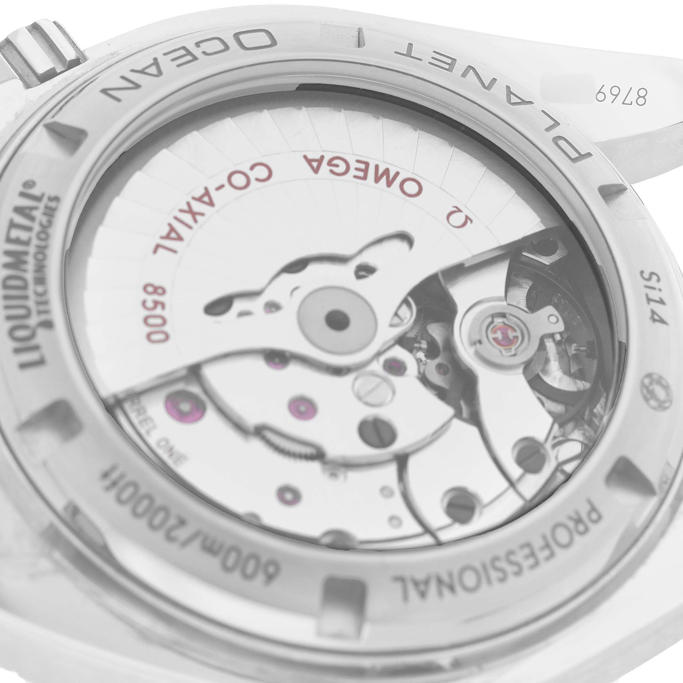 The image shows the case back of an Omega Seamaster 232.90.42.21.03.001 Men's Titanium Blue Dial, featuring its movement and inscriptions.