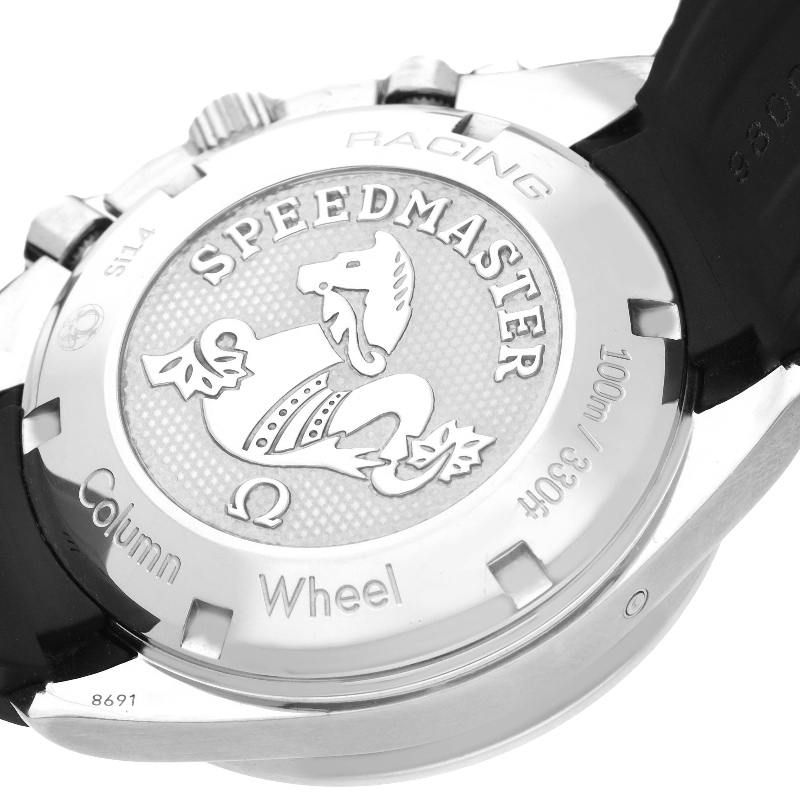 The image shows the back case of an Omega Speedmaster 326.32.40.50.11.001 Men
s Stainless Steel Red Dial 326.32.40.50.11.001 Men
s Stainless Steel Red Dial watch, highlighting its engraved design and branding.