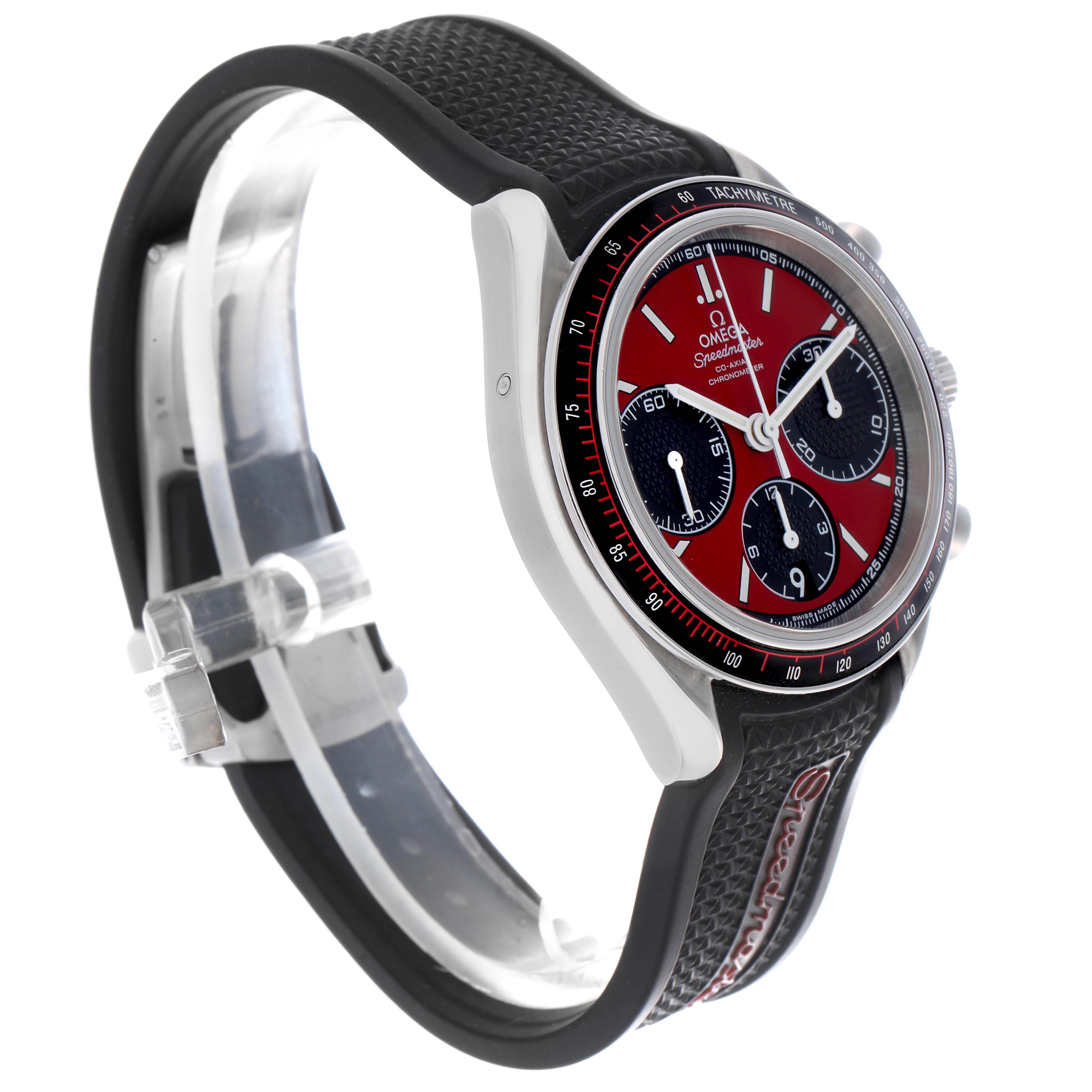 The Omega Speedmaster 326.32.40.50.11.001 Men
s Stainless Steel Red Dial 326.32.40.50.11.001 Men
s Stainless Steel Red Dial watch is shown at a three-quarter angle highlighting the case, bezel, dial, and textured strap.