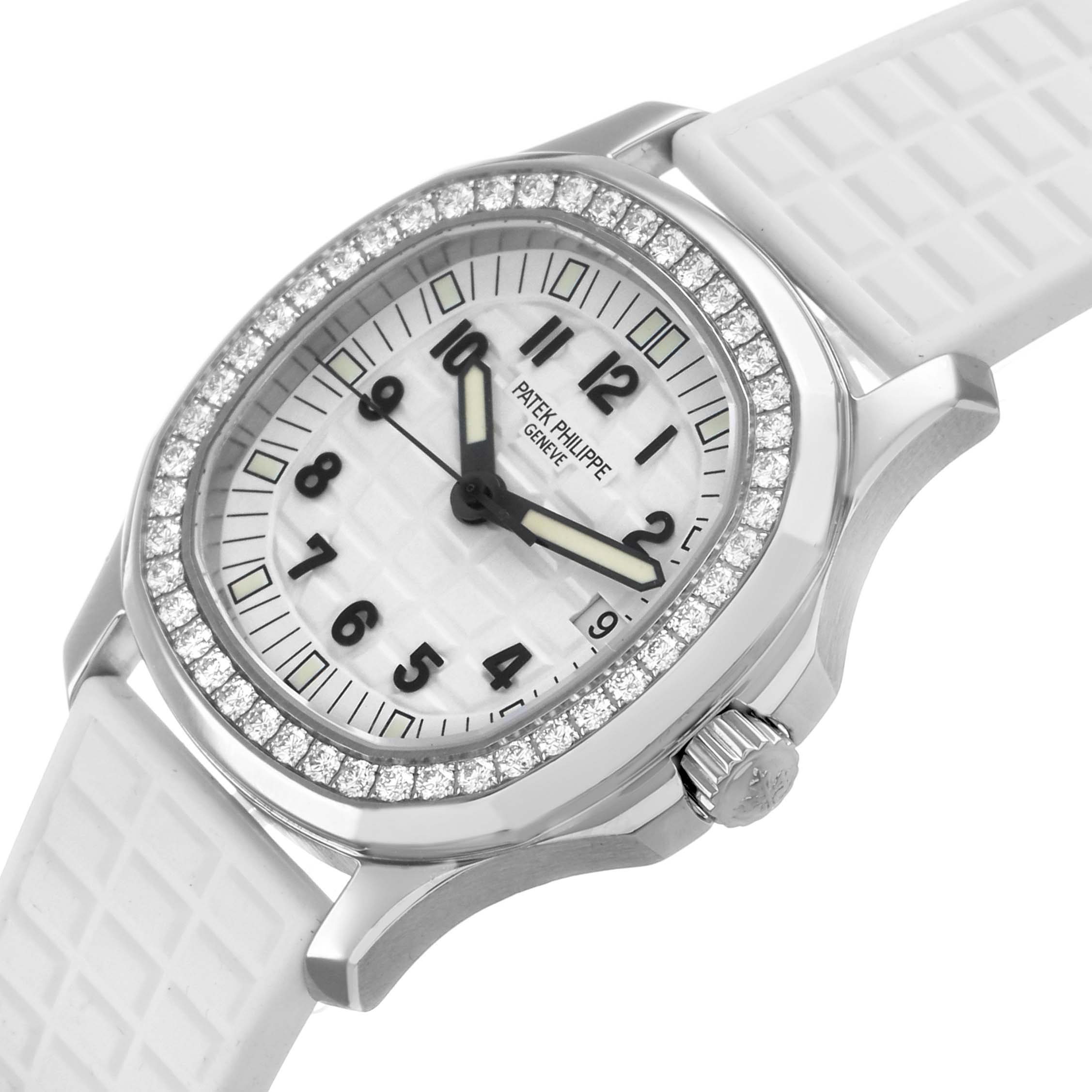 The Patek Philippe Aquanaut 5067A/011 Women's Stainless Steel White Dial watch is shown at a slight angle, highlighting the diamond bezel, textured dial, and white strap.