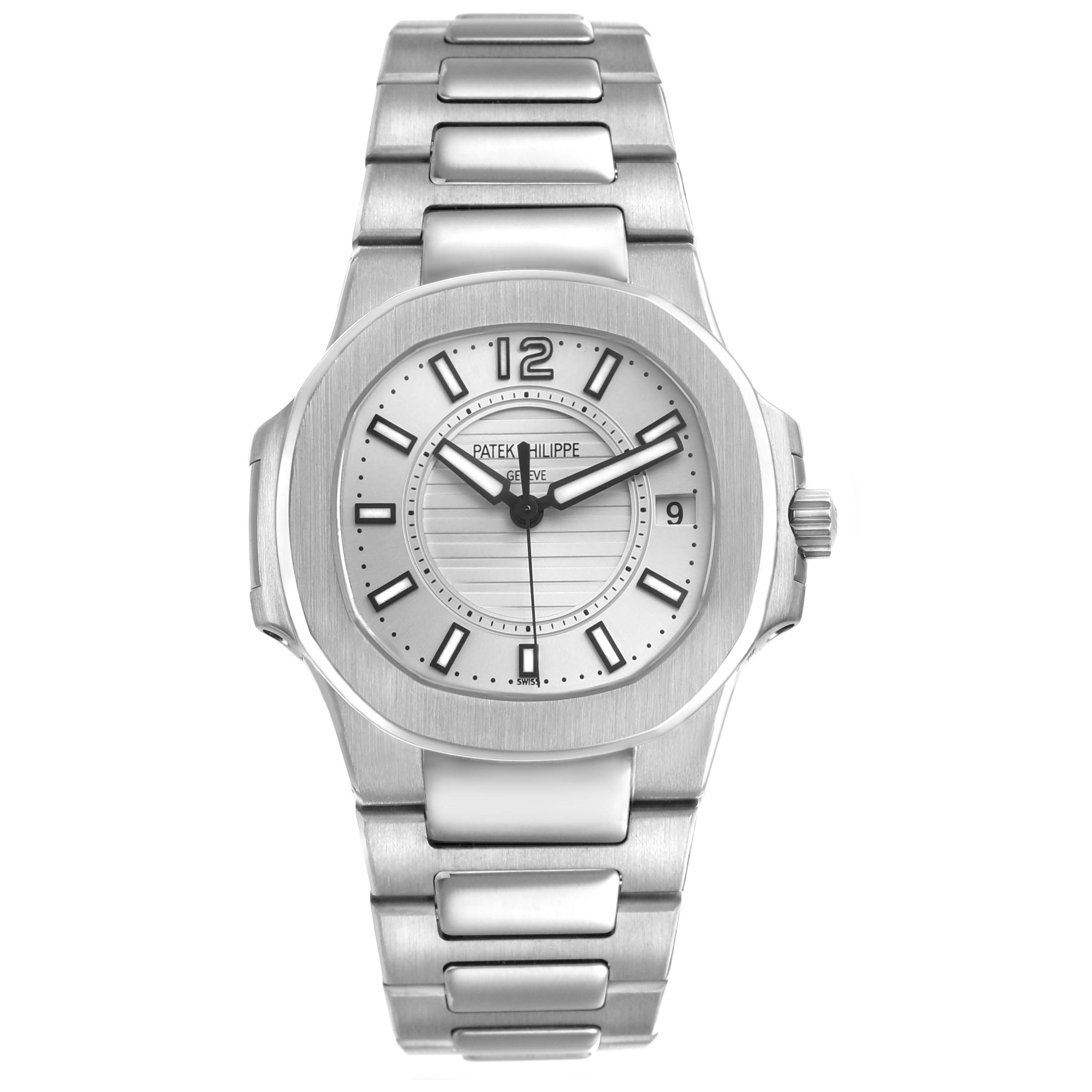 The image shows a Patek Philippe Nautilus 7011/1G-001 Women's White Gold Silver Dial watch from a frontal view, highlighting the dial, bezel, and bracelet.