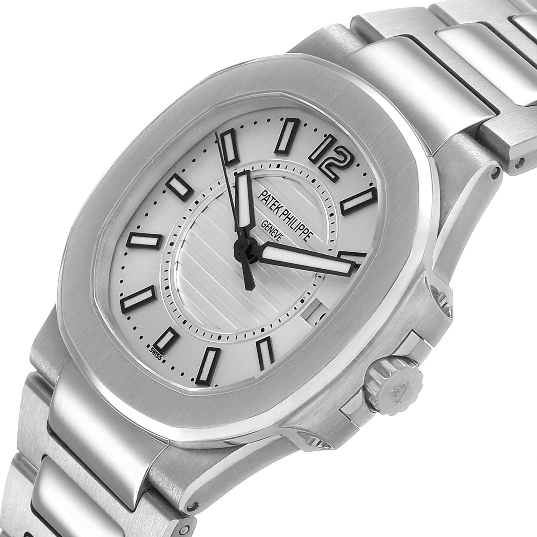 The Patek Philippe Nautilus 7011/1G-001 Women's White Gold Silver Dial watch is shown at an angle displaying the dial, bezel, crown, and part of the bracelet.