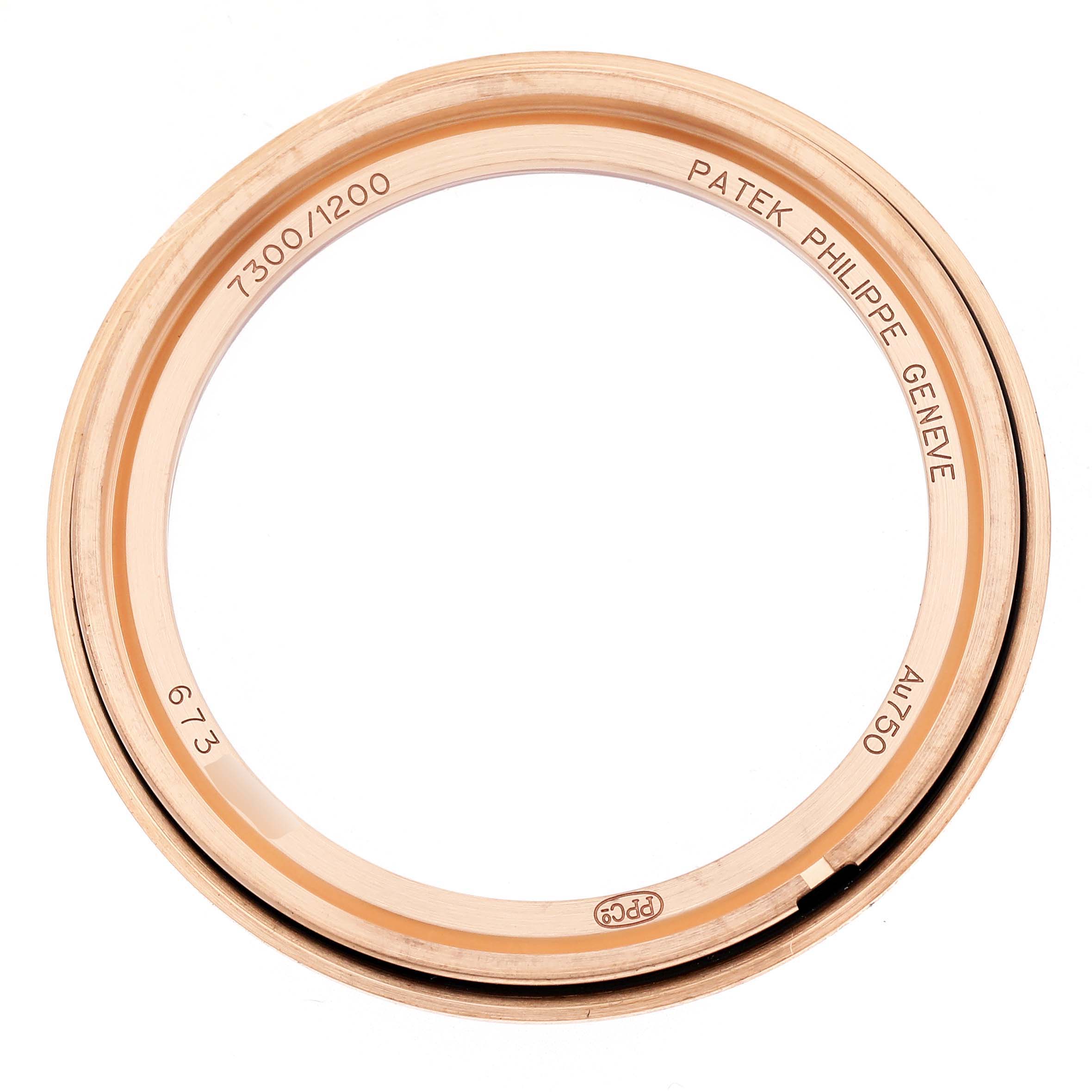 This image shows a close-up of the bezel for the Patek Philippe Twenty-4 7300/1200R-010 Women's Rose Gold Silver Dial model, viewed from above.