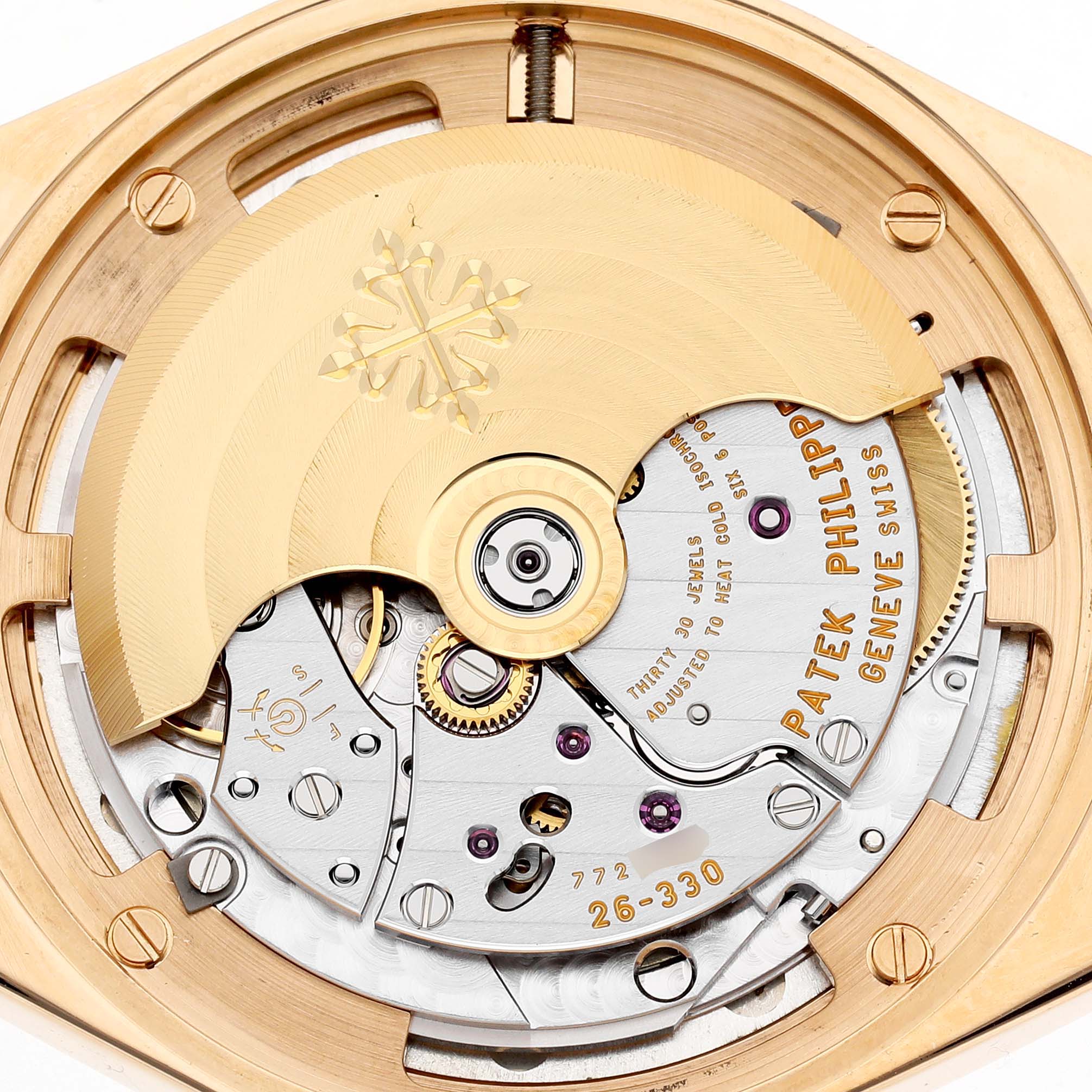 The image shows the movement of a Patek Philippe Twenty-4 7300/1200R-010 Women's Rose Gold Silver Dial model from a top-down angle, highlighting the rotor and intricate components.