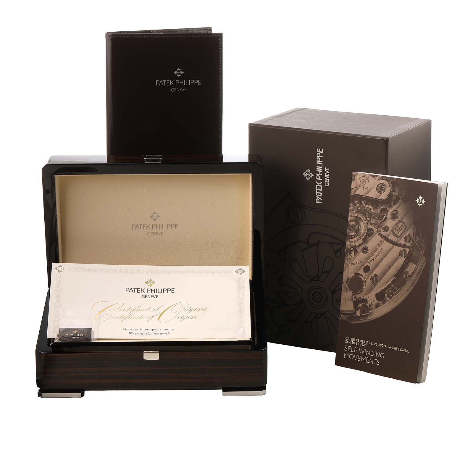 The image shows the packaging and accessories of a Patek Philippe Twenty-4 7300/1200R-010 Women's Rose Gold Silver Dial, including its box, certificate, and manuals.