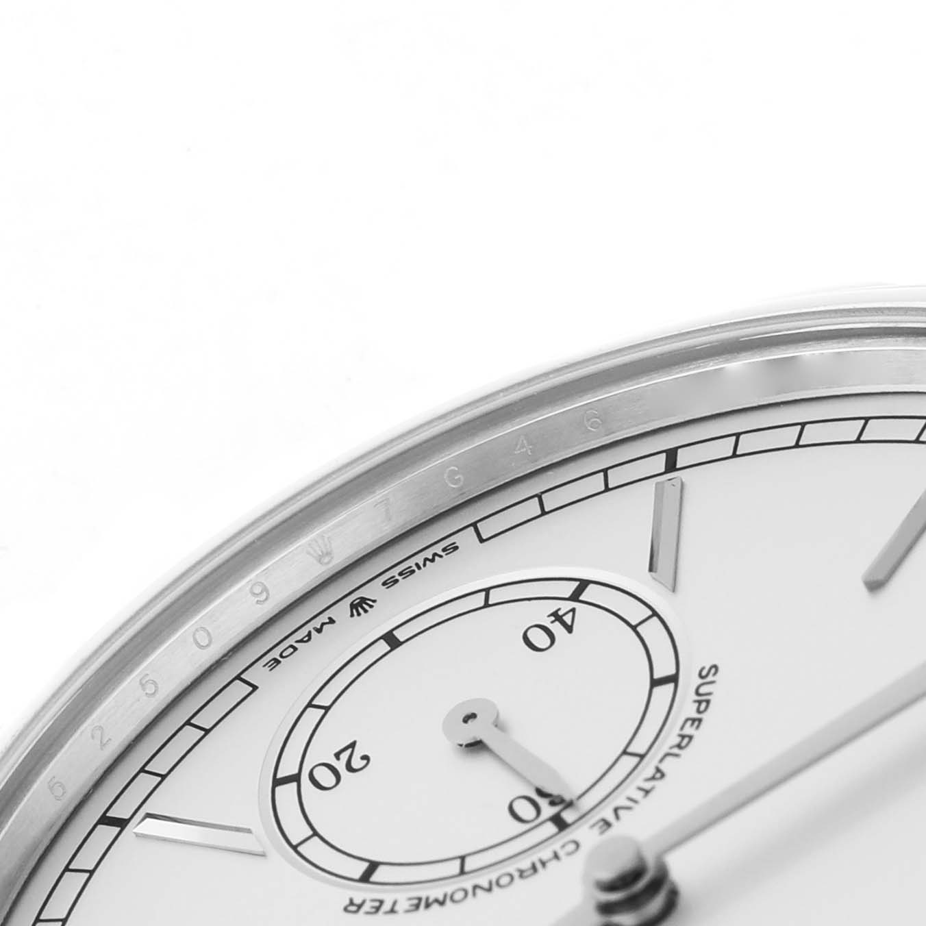 The image shows a close-up of the Rolex Cellini 52509 Men's White Gold Silver Dial watch face, highlighting the dial and part of the bezel.