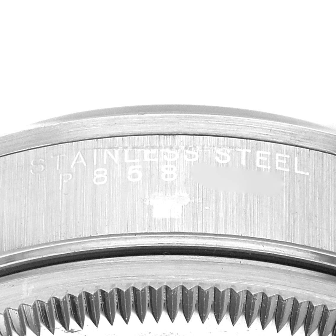 This is a close-up view of the case back engravings on an Air-King model by Rolex.