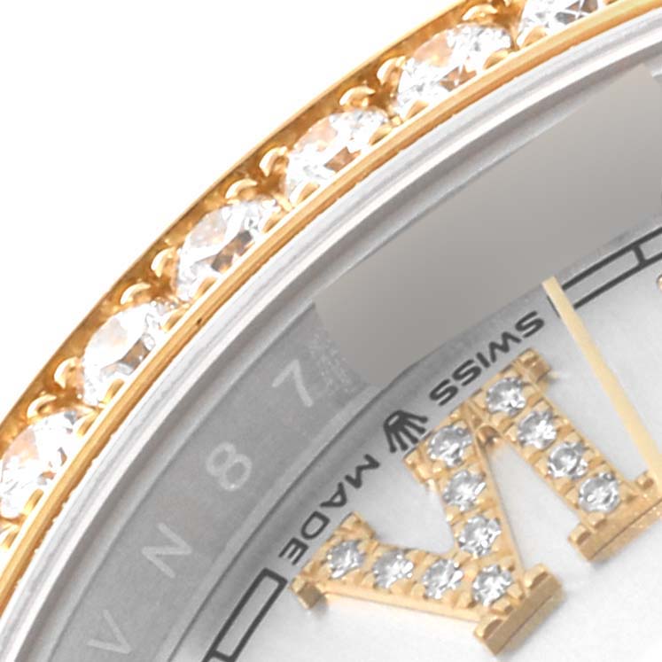 The image shows a close-up of the diamond-studded bezel and part of the dial of a Rolex Datejust 126283 Men's Steel and Gold (two tone) Silver Dial 126283 Men's Steel and Gold (two tone) Silver Dial watch.
