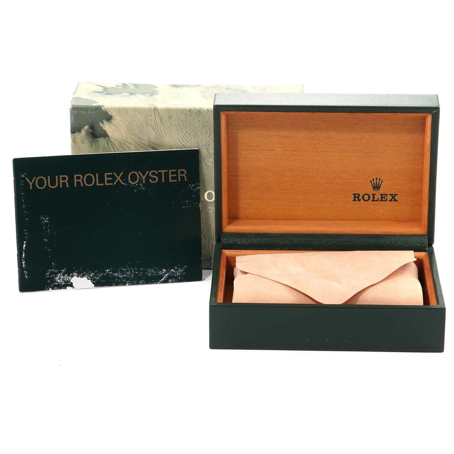 The image shows the packaging and the inner box of a Vintage Collection Rolex watch with a manual titled "YOUR ROLEX OYSTER."