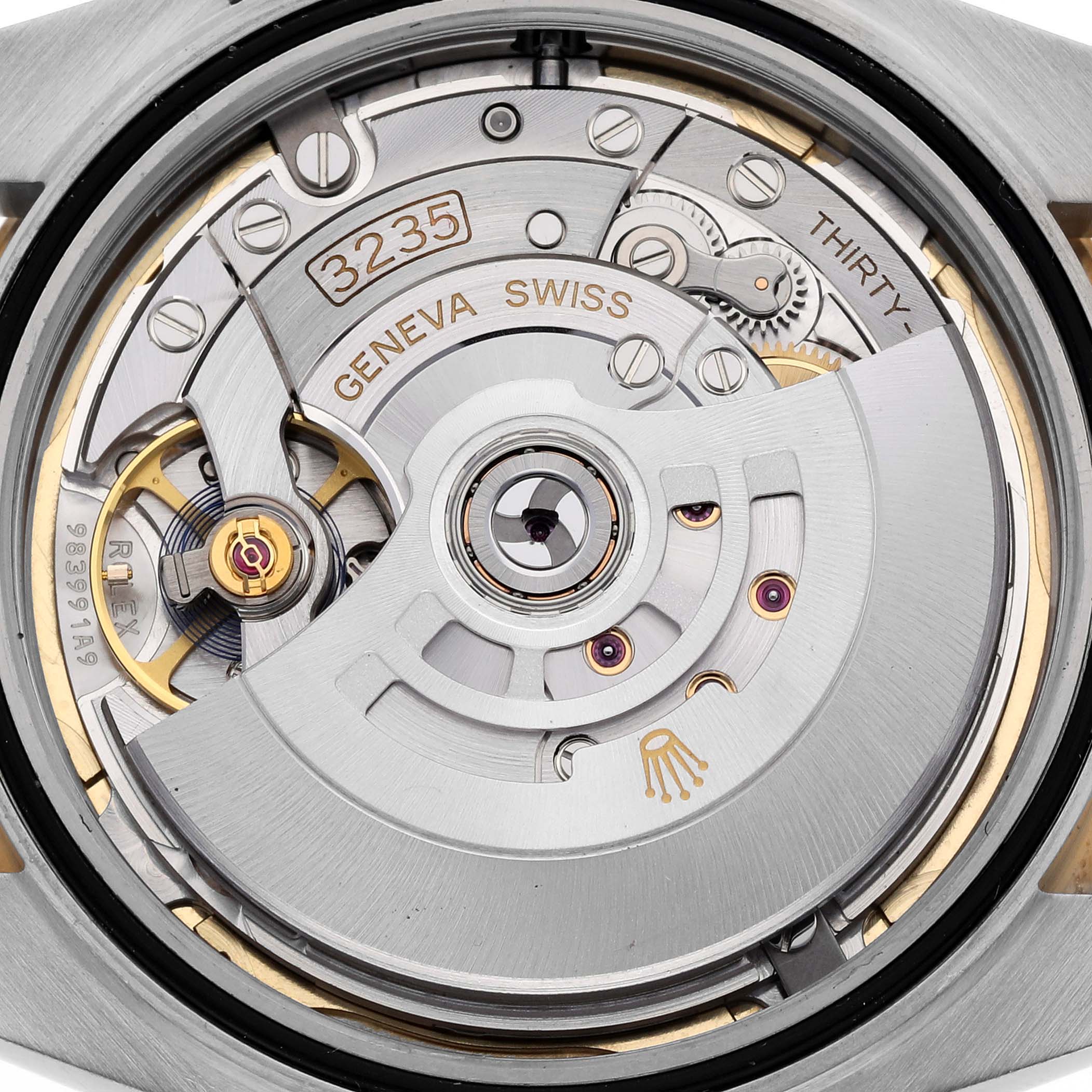 The image shows a close-up view of the movement mechanism inside a Rolex Datejust 41 M126333-0012 Men's Steel and Gold (two tone) Champagne Dial M126333-0012 Men's Steel and Gold (two tone) Champagne Dial watch.