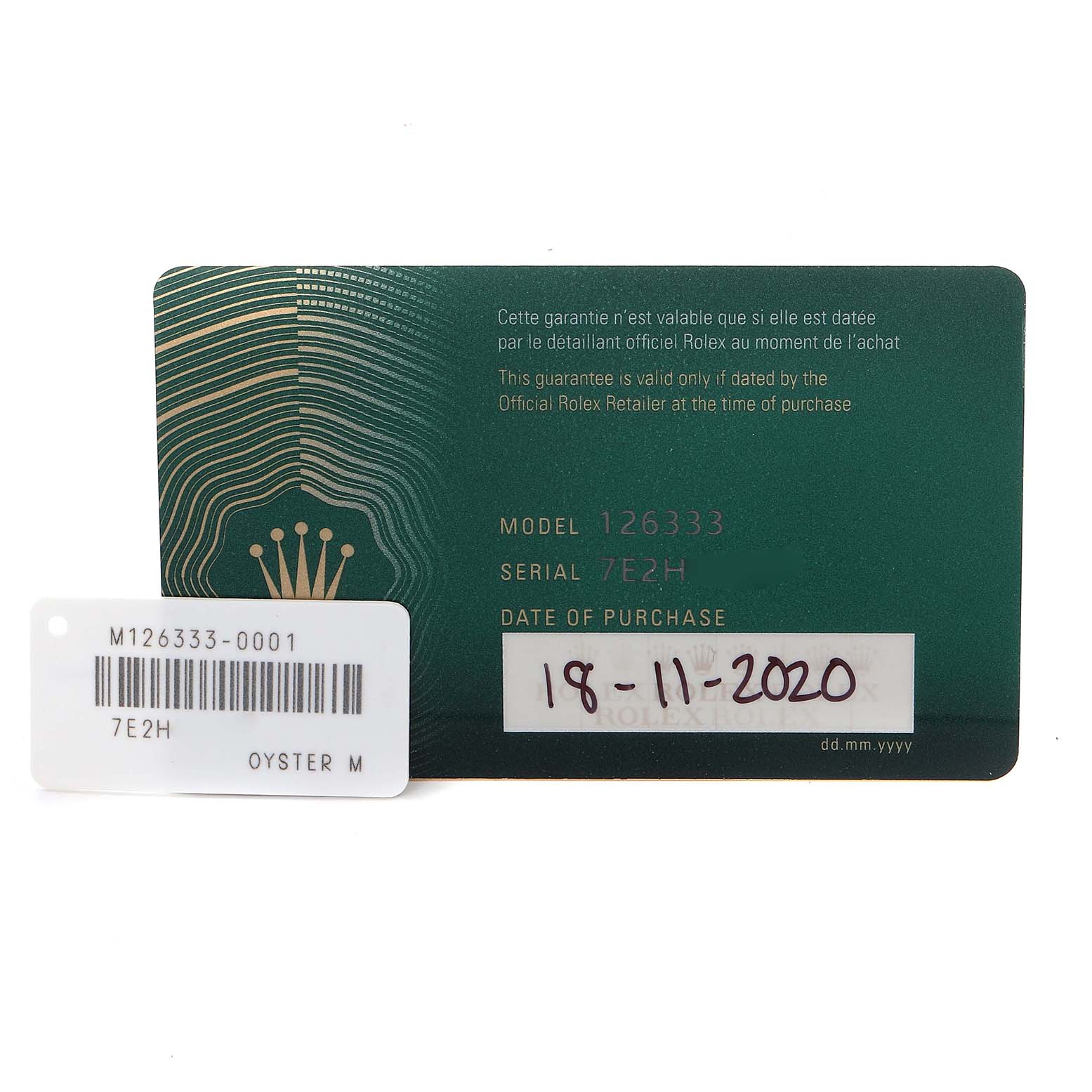 The image shows the warranty card and tag for the Rolex Datejust 41 126333 Men
s Steel and Gold (two tone) Silver Dial 126333 Men
s Steel and Gold (two tone) Silver Dial model, displaying model and serial numbers.