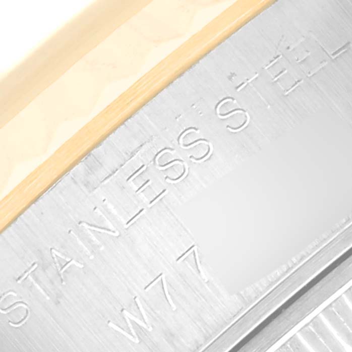 The image shows a close-up of the stainless steel case back of a Rolex Datejust 69173 Women's Steel and Gold (two tone) Champagne Dial 69173 Women's Steel and Gold (two tone) Champagne Dial watch.