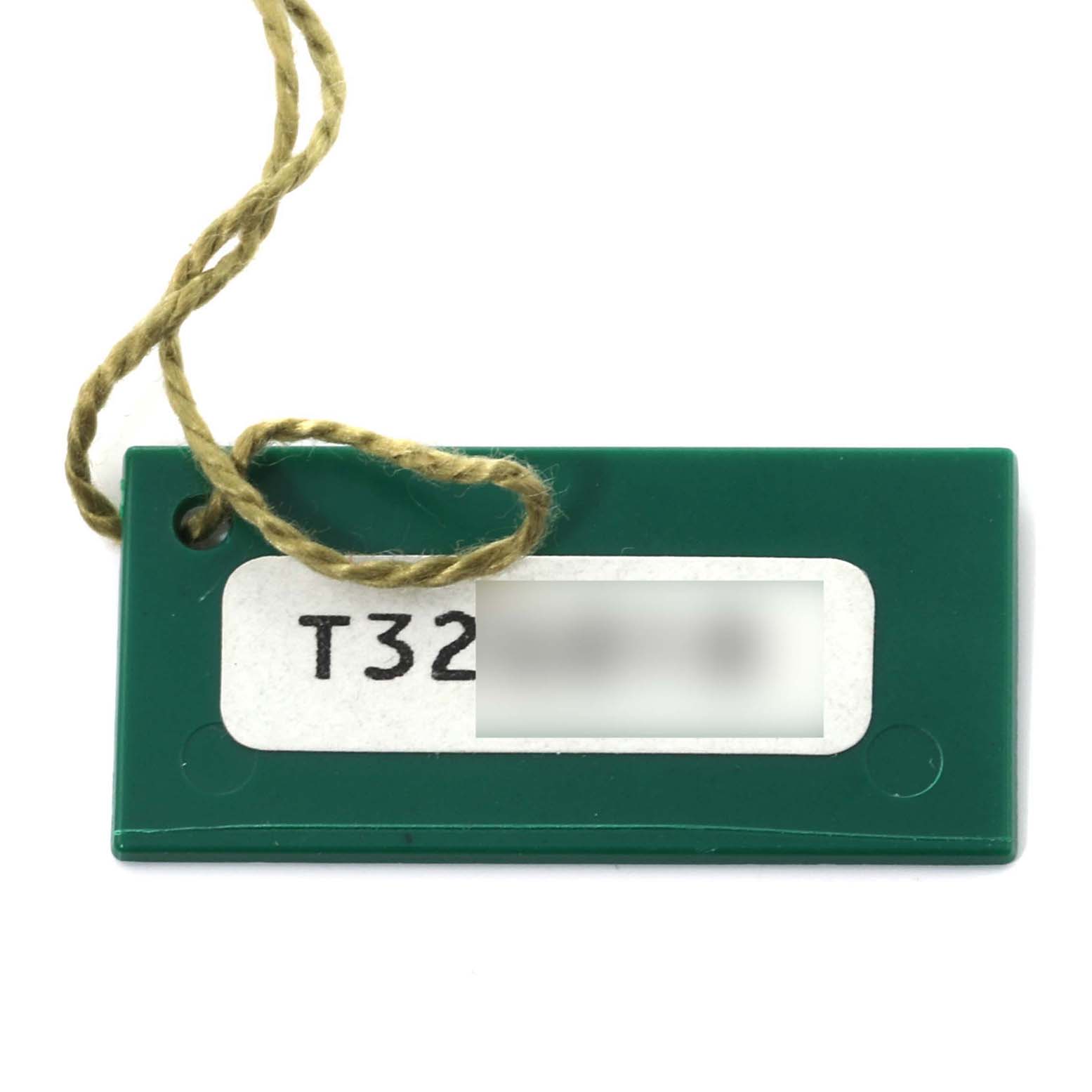 A green Rolex Datejust 69173 Women's Steel and Gold (two tone) White Dial 69173 Women's Steel and Gold (two tone) White Dial model tag with a string attachment is shown close-up.