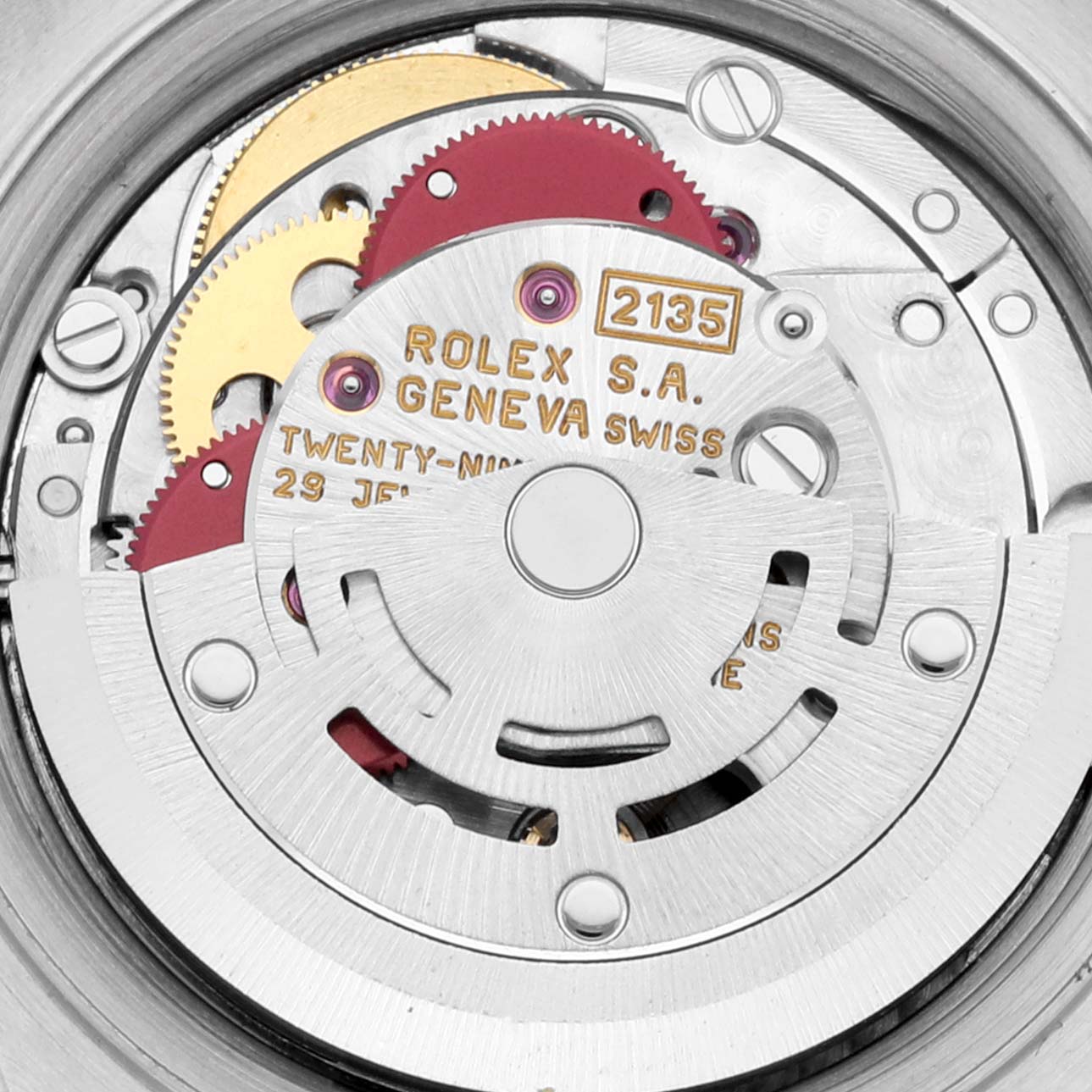 This image shows the intricate internal mechanism of the Rolex Datejust 69173 Women's Steel and Gold (two tone) White Dial 69173 Women's Steel and Gold (two tone) White Dial, showcasing gears and components from an overhead angle.