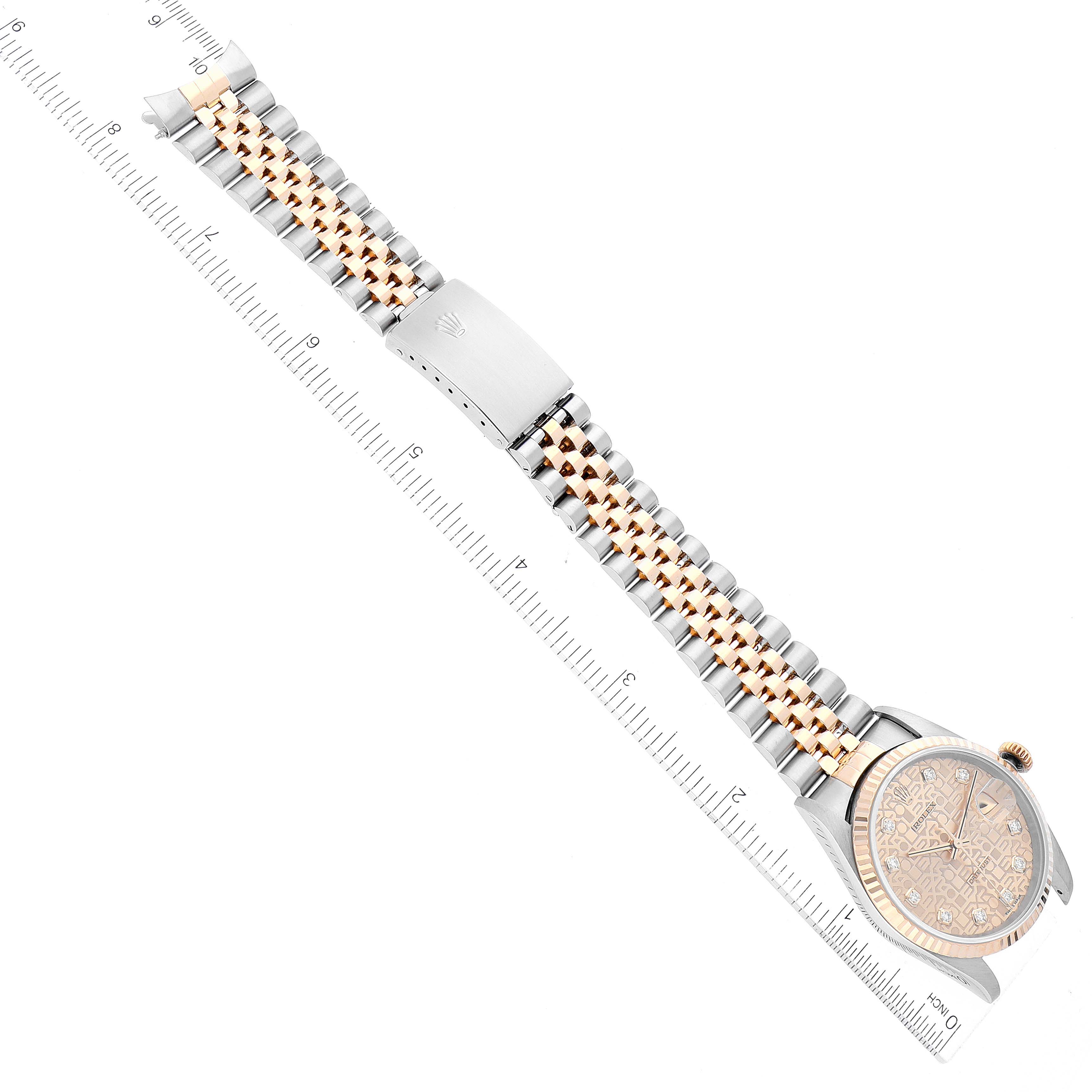 The image shows a top-down view of a Rolex Datejust 16233 Men's Steel and Gold (two tone) Champagne Dial 16233 Men's Steel and Gold (two tone) Champagne Dial watch, highlighting its band, clasp, and partially its face.