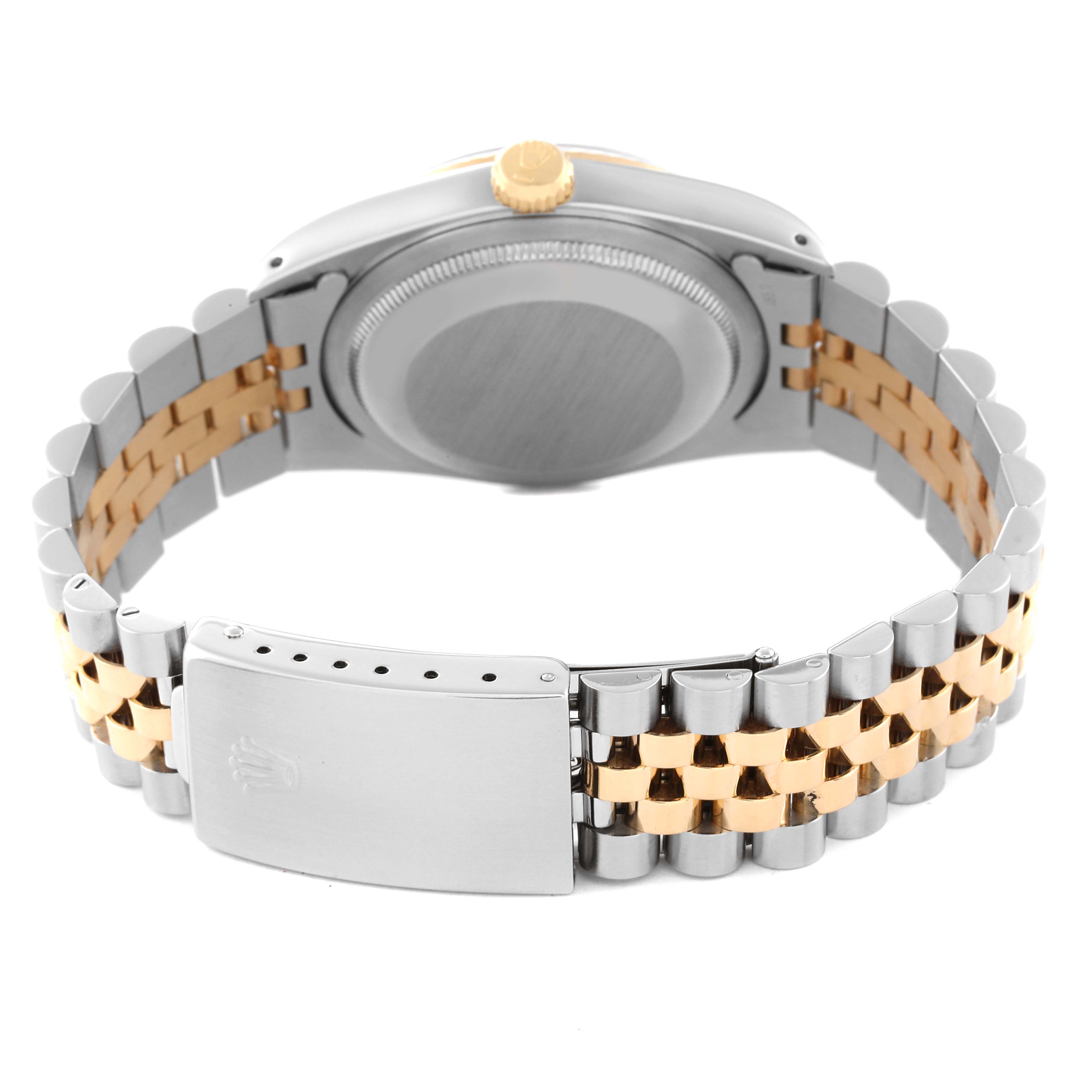 The image shows the back view of a Rolex Datejust 16233 Men's Steel and Gold (two tone) Black Dial 16233 Men's Steel and Gold (two tone) Black Dial watch, highlighting its case back, Jubilee bracelet, and clasp.