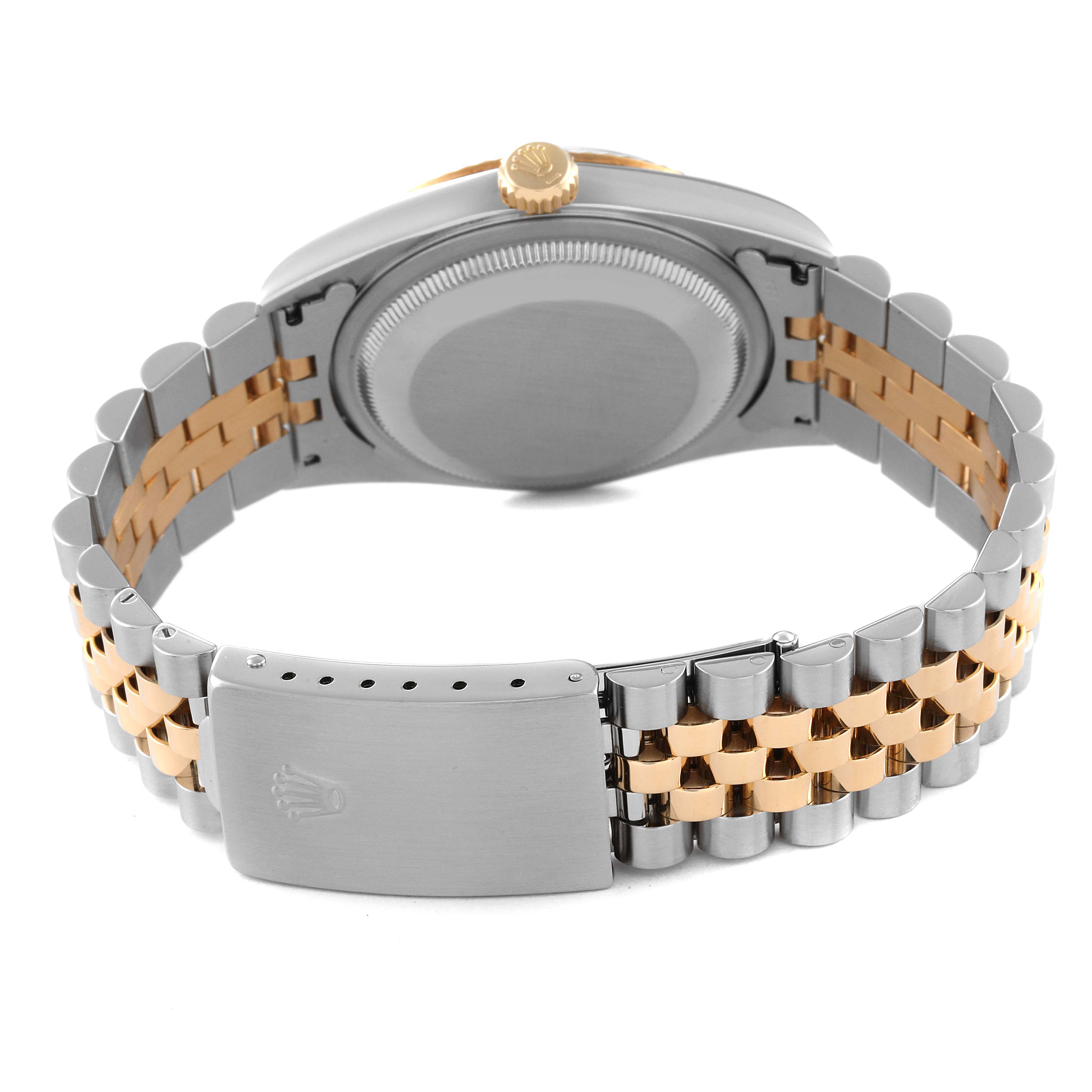 The Rolex Datejust 16233 Men's Steel and Gold (two tone) Blue Dial 16233 Men's Steel and Gold (two tone) Blue Dial watch is shown from the back, highlighting the gold and silver Jubilee bracelet and clasp.