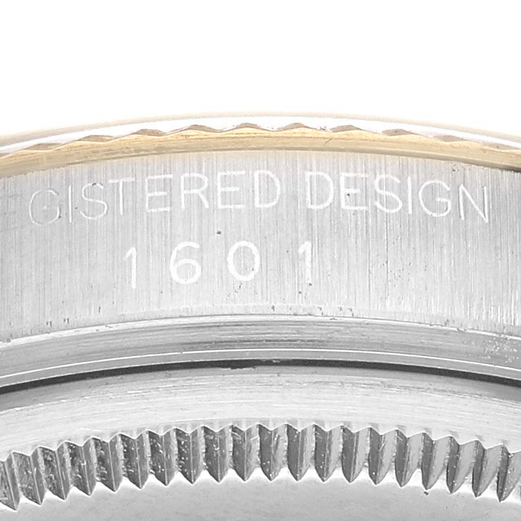 The image shows a close-up of the side casing and bezel teeth of the Rolex Vintage Collection 1601 Men's Steel and Gold (two tone) Champagne Dial 1601 Men's Steel and Gold (two tone) Champagne Dial model 1601.