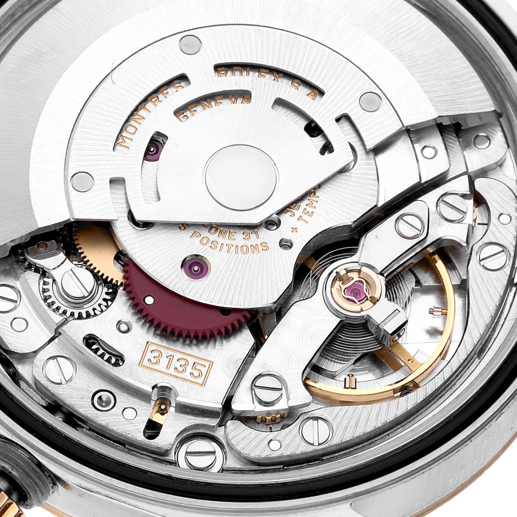 This image shows a close-up of the internal mechanical movement of a Rolex Datejust 16233 Men's Steel and Gold (two tone) White Dial 16233 Men's Steel and Gold (two tone) White Dial watch.