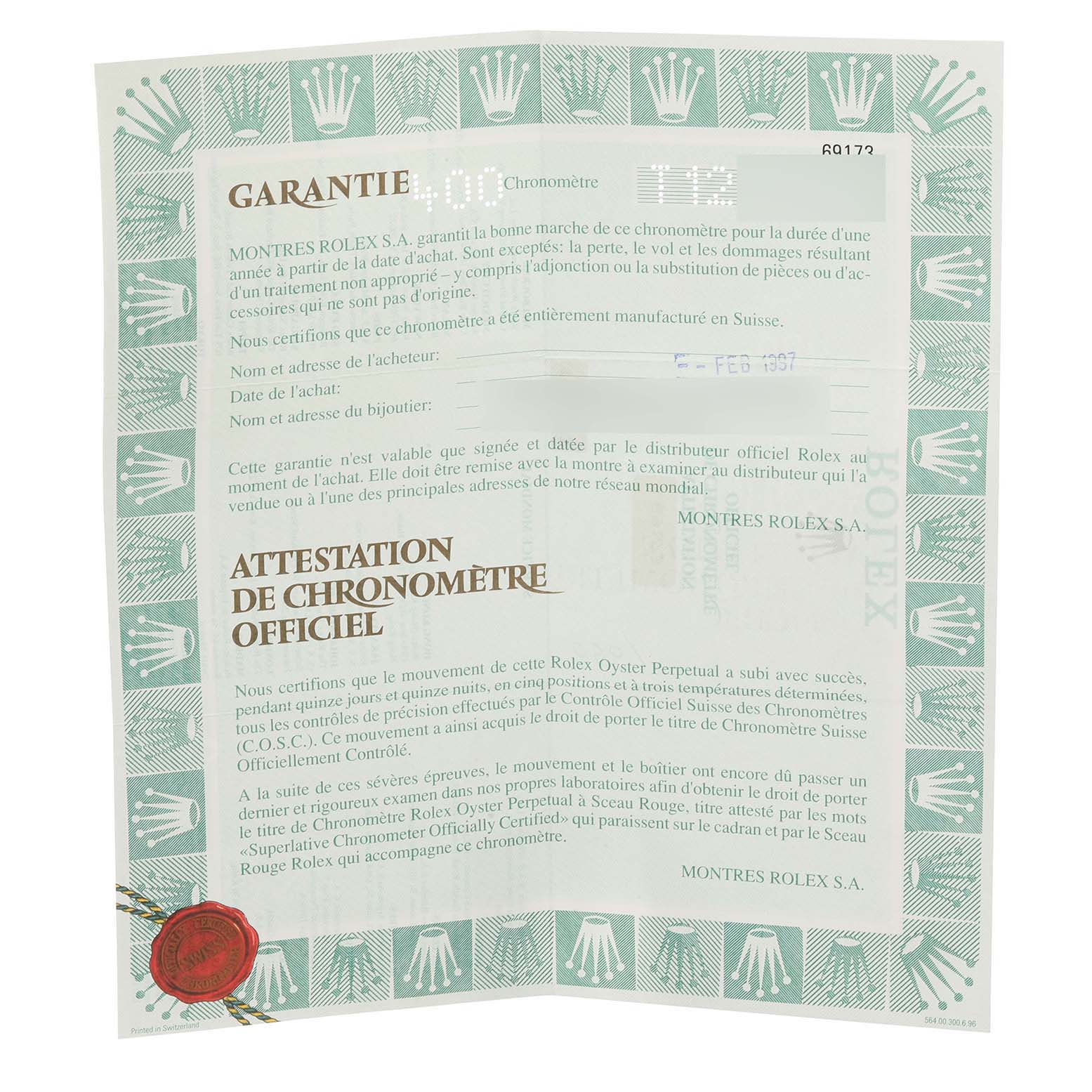 The image shows a warranty and official chronometer certificate for a Rolex Datejust 69173 Women's Steel and Gold (two tone) Grey Dial 69173 Women's Steel and Gold (two tone) Grey Dial watch, featuring text and a decorative border.