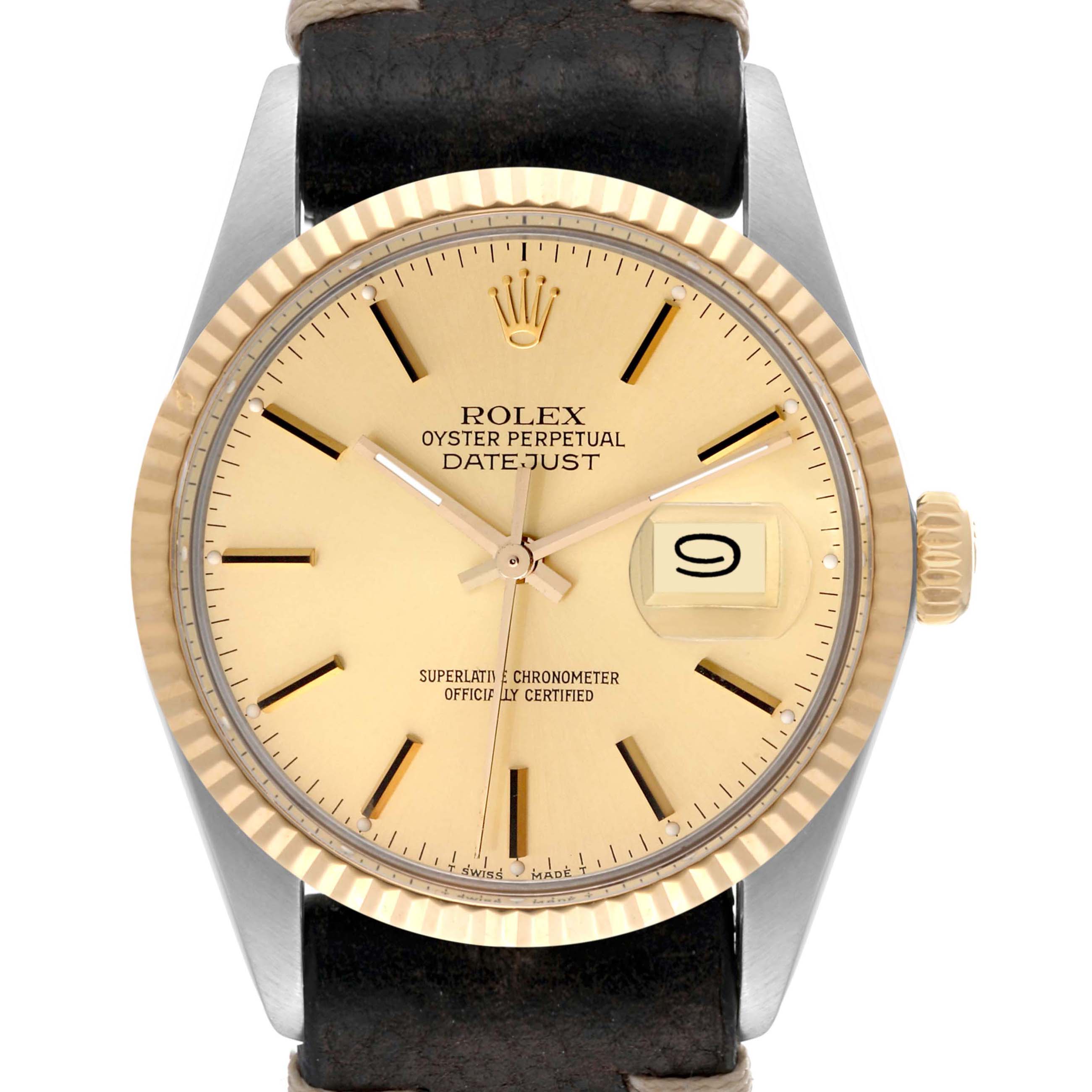 This is a front view of the Rolex Vintage Collection 16013 Men's Steel and Gold (two tone) Champagne Dial 16013 Men's Steel and Gold (two tone) Champagne Dial Oyster Perpetual Datejust watch, showing the dial, hands, and leather strap.