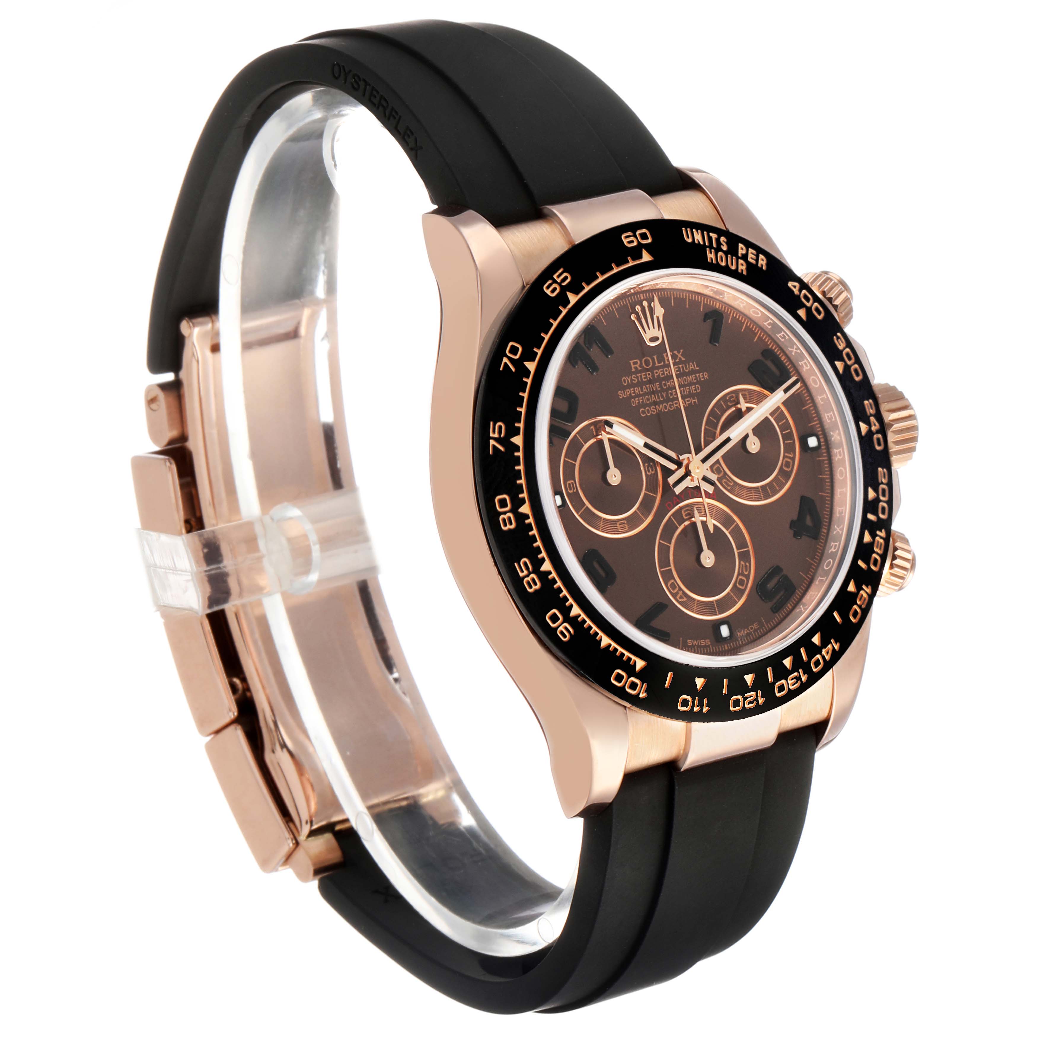 The Rolex Daytona 116515LN Men's Rose Gold Brown Dial is shown at a three-quarter angle, highlighting the face, bezel, pushers, and black rubber strap.