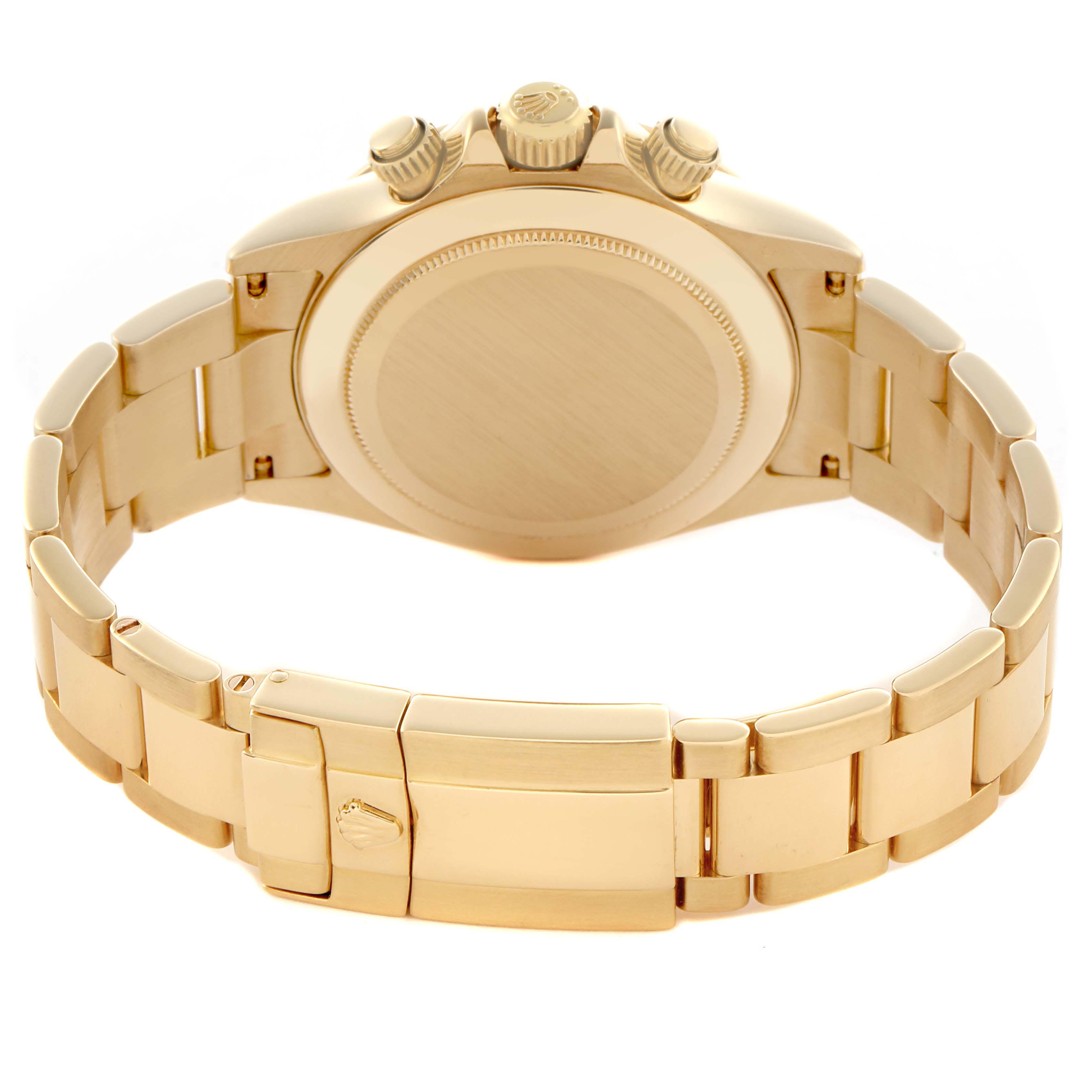 The image shows the back of a Rolex Daytona 116528 Men
s Yellow Gold Black Dial 116528 Men
s Yellow Gold Black Dial watch, highlighting its bracelet, clasp, case back, and crown with pushers.