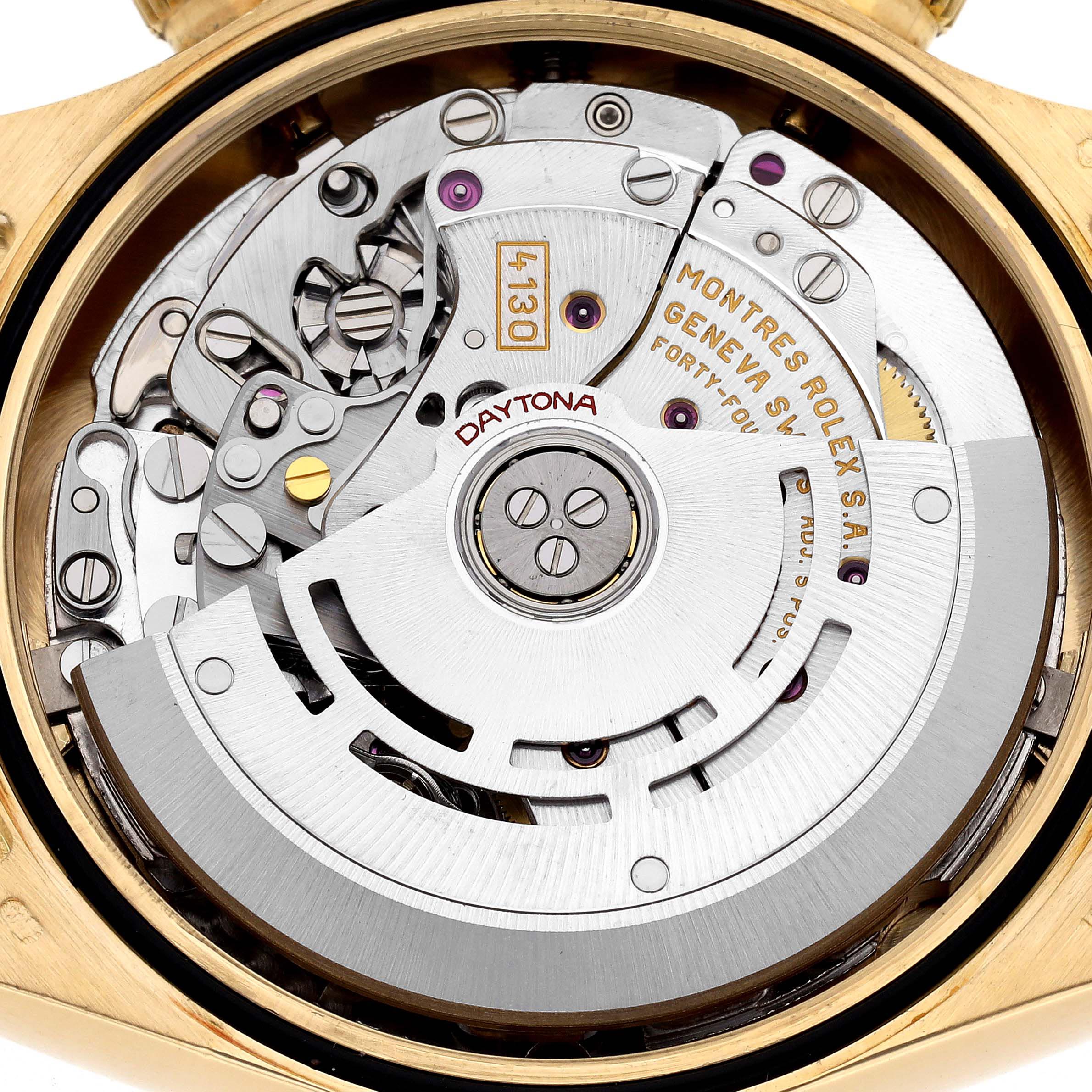 This image shows the movement of a Rolex Daytona 116528 Men
s Yellow Gold Black Dial 116528 Men
s Yellow Gold Black Dial watch from a back view, highlighting its intricate mechanical parts.